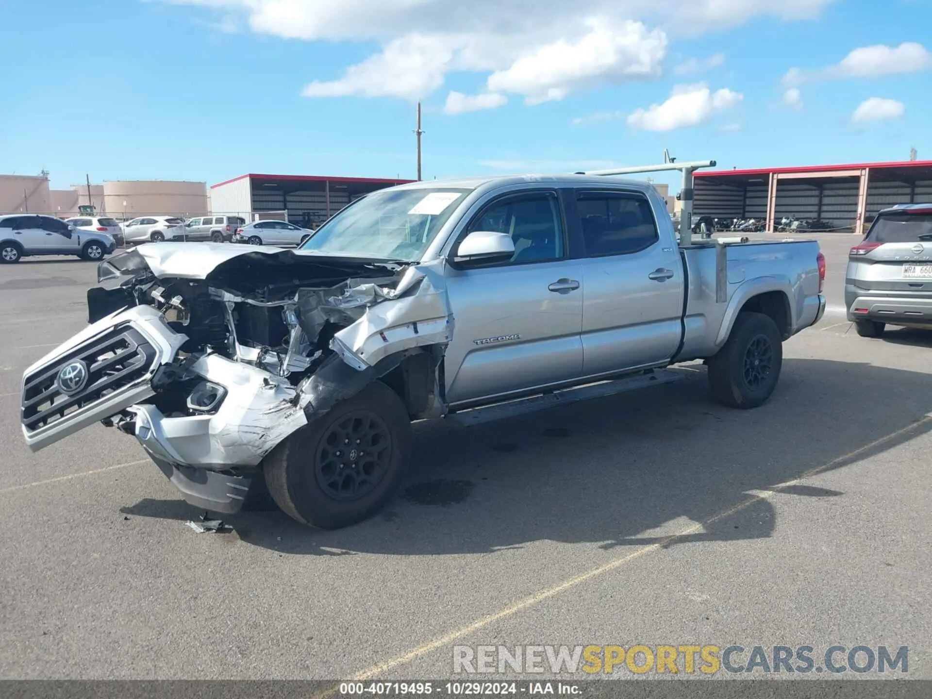2 fotografías del automóvil dañado 3TYBZ5DN6NT001695 TOYOTA TACOMA 2022