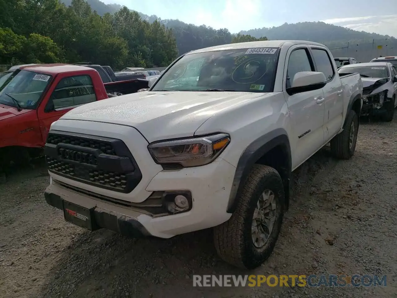 2 fotografías del automóvil dañado 3TYCZ5AN1NT056421 TOYOTA TACOMA 2022