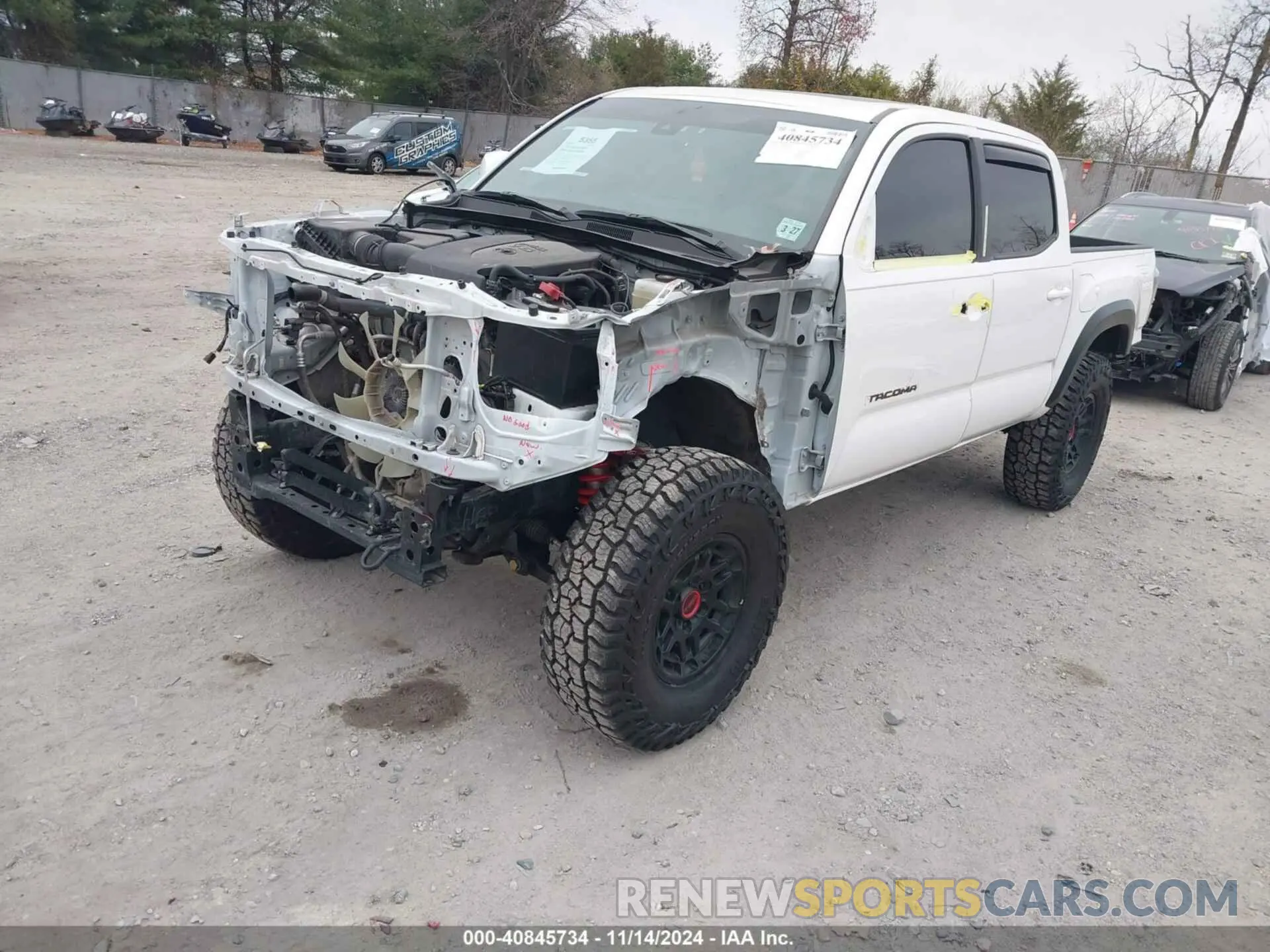 2 fotografías del automóvil dañado 3TYCZ5AN2NT064978 TOYOTA TACOMA 2022