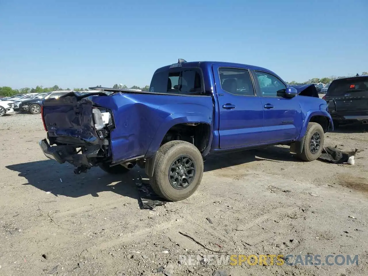 3 fotografías del automóvil dañado 3TYCZ5AN3NT077464 TOYOTA TACOMA 2022