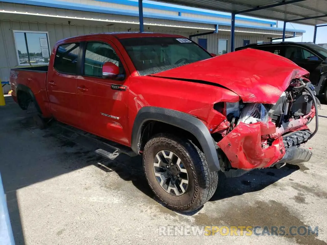 4 fotografías del automóvil dañado 3TYDZ5BN7NT016315 TOYOTA TACOMA 2022