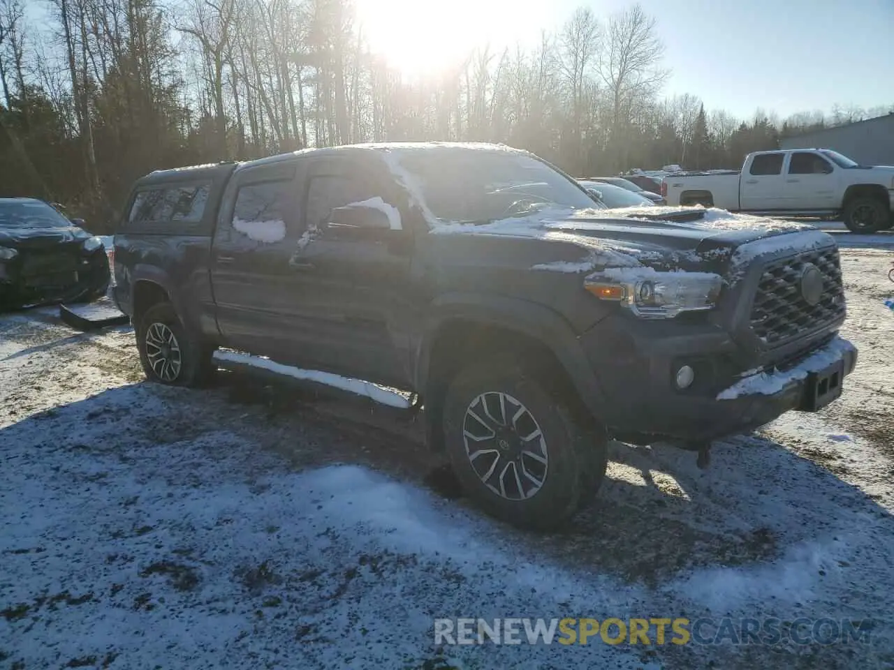 4 fotografías del automóvil dañado 3TYDZ5BN9NT013660 TOYOTA TACOMA 2022