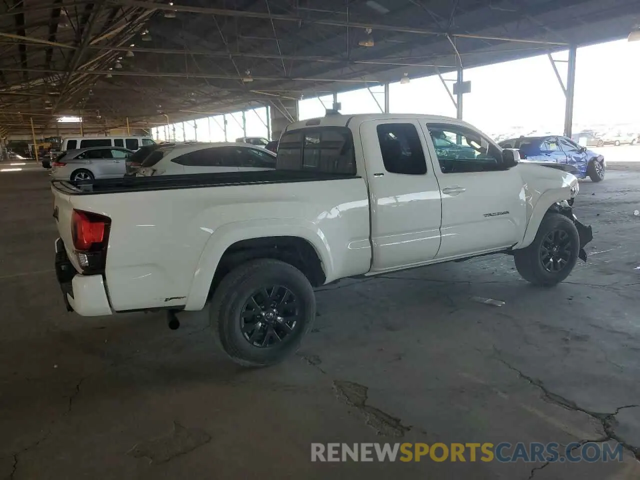 3 fotografías del automóvil dañado 3TYSZ5AN2NT074499 TOYOTA TACOMA 2022