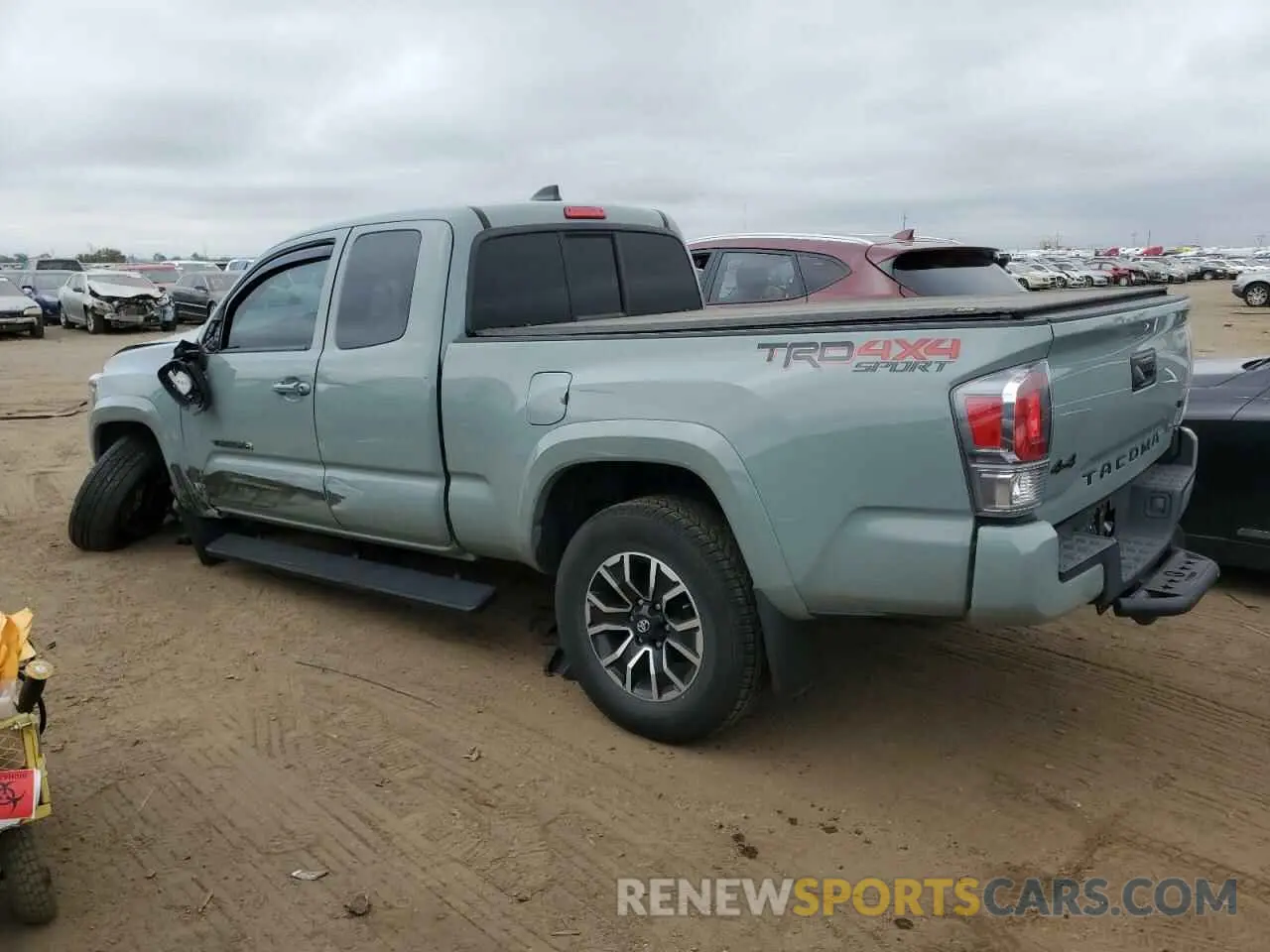 2 fotografías del automóvil dañado 3TYSZ5AN3NT057811 TOYOTA TACOMA 2022