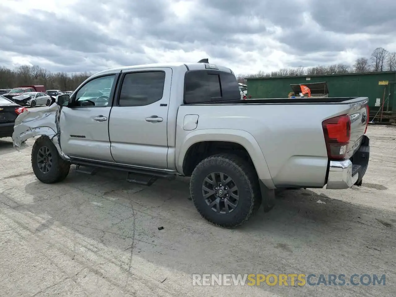 2 fotografías del automóvil dañado 3TMAZ5CN0PM201788 TOYOTA TACOMA 2023