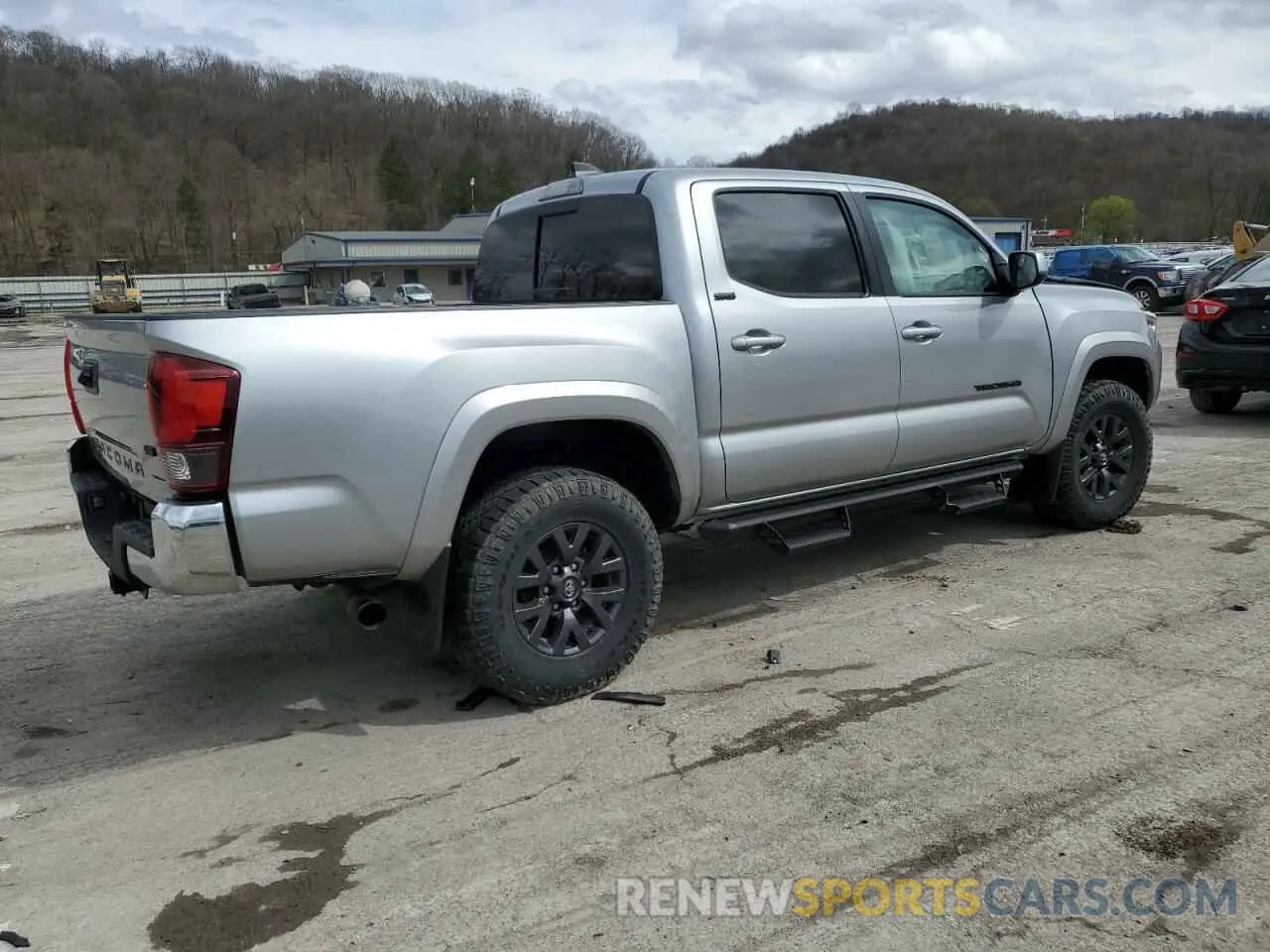 3 fotografías del automóvil dañado 3TMAZ5CN0PM201788 TOYOTA TACOMA 2023