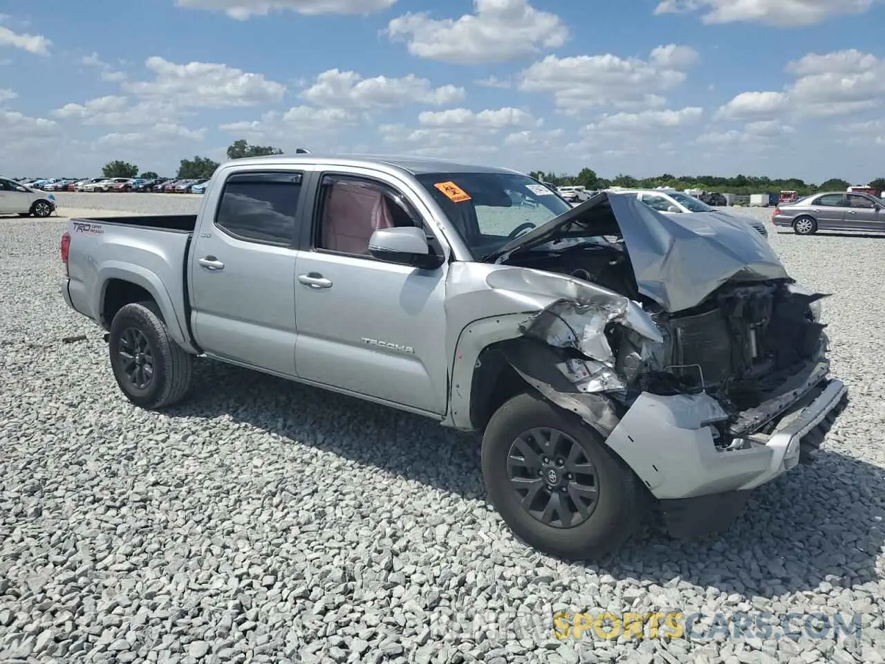 4 fotografías del automóvil dañado 3TMAZ5CN0PM213228 TOYOTA TACOMA 2023