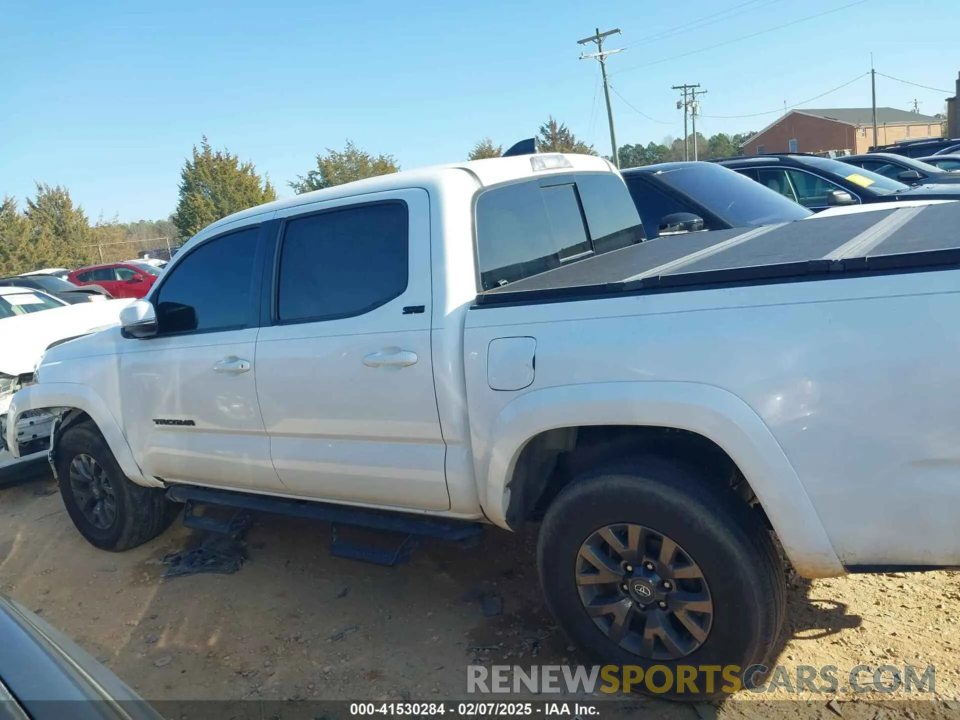 14 fotografías del automóvil dañado 3TMAZ5CN0PM214752 TOYOTA TACOMA 2023