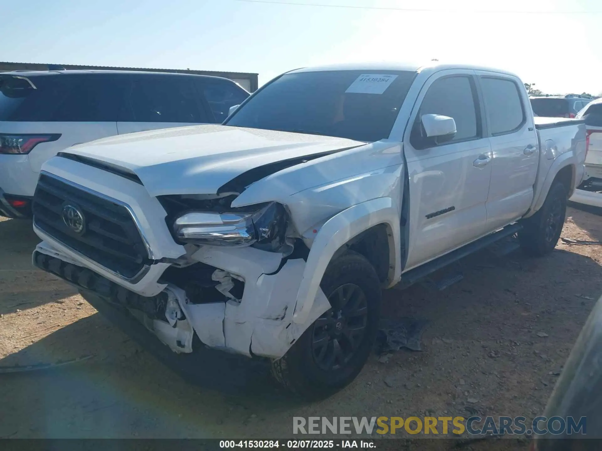 2 fotografías del automóvil dañado 3TMAZ5CN0PM214752 TOYOTA TACOMA 2023