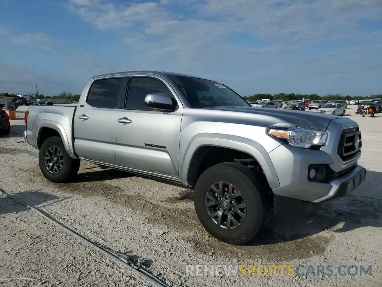4 fotografías del automóvil dañado 3TMAZ5CN1PM205932 TOYOTA TACOMA 2023