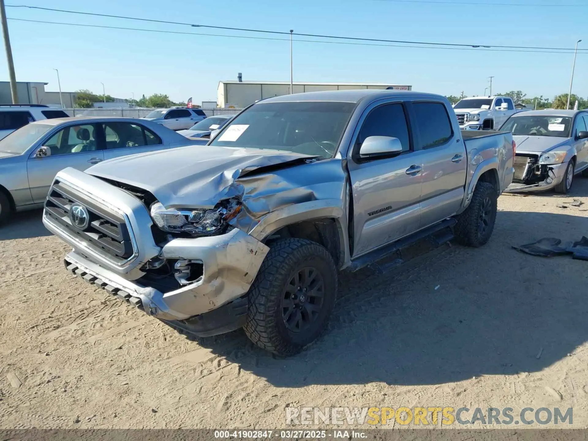 2 fotografías del automóvil dañado 3TMAZ5CN1PM211066 TOYOTA TACOMA 2023
