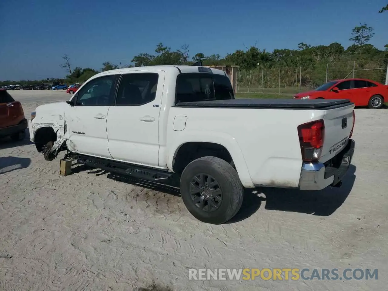 2 fotografías del automóvil dañado 3TMAZ5CN3PM212056 TOYOTA TACOMA 2023