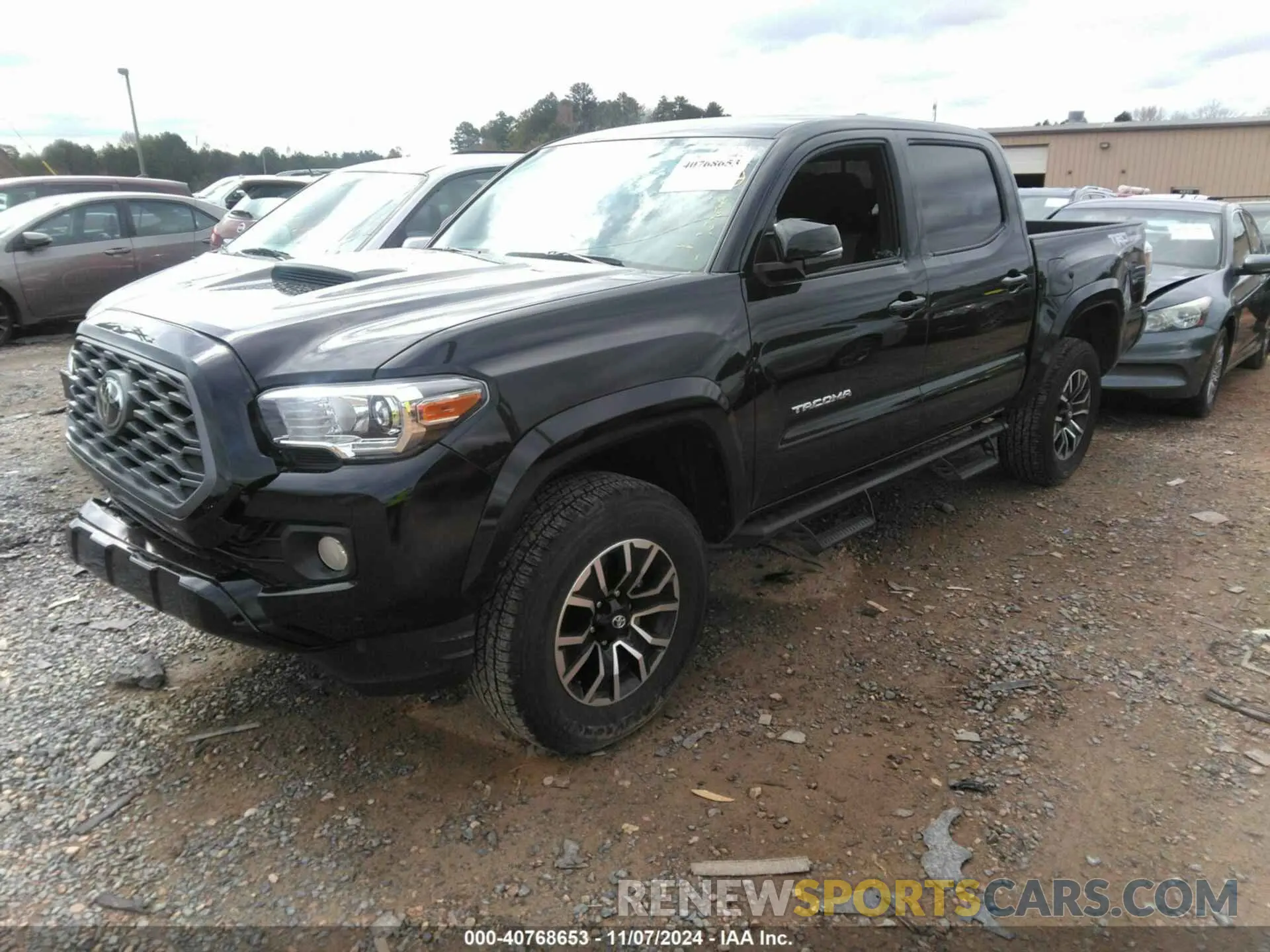 2 fotografías del automóvil dañado 3TMAZ5CN5PM215847 TOYOTA TACOMA 2023