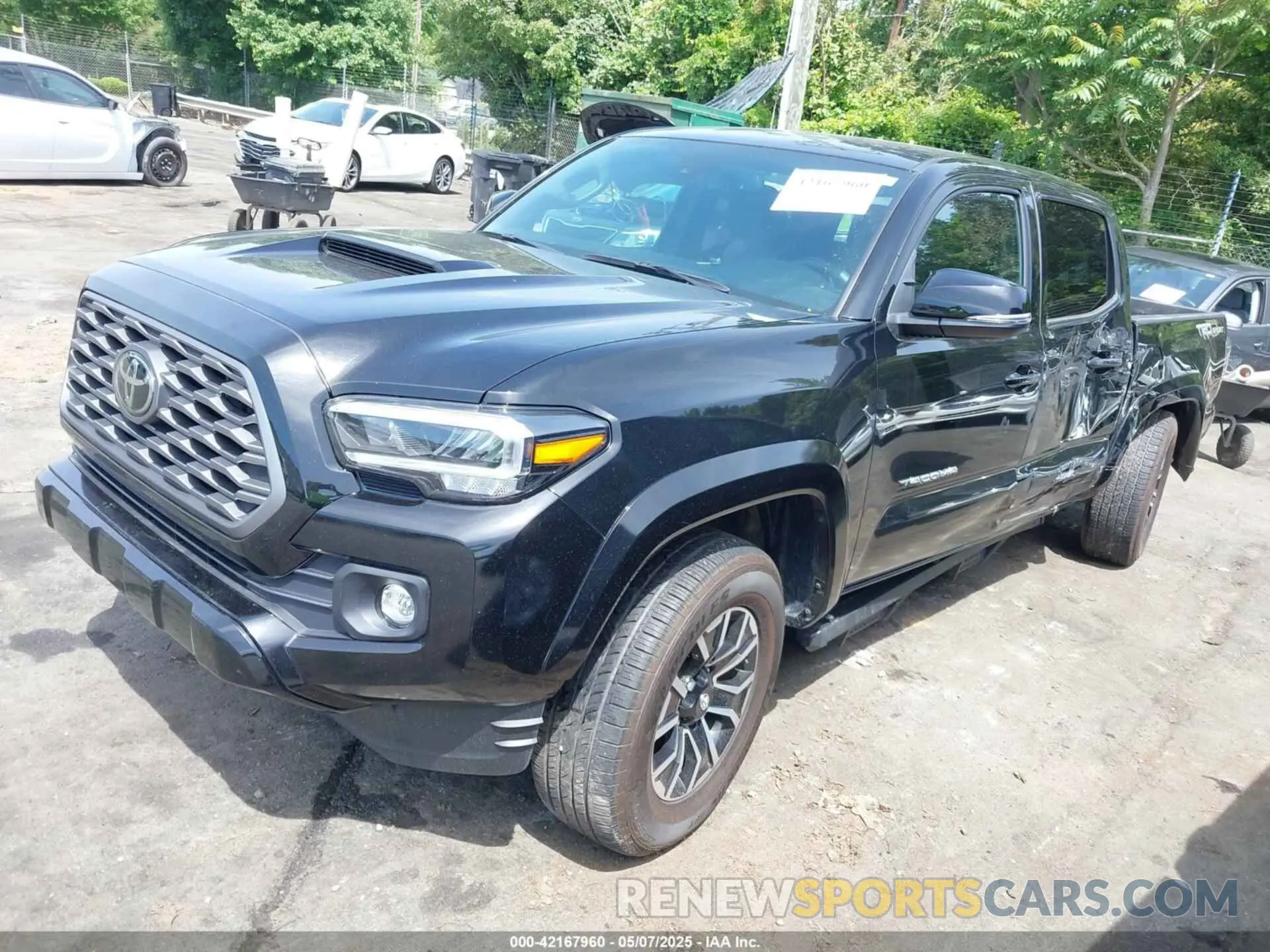 2 fotografías del automóvil dañado 3TMAZ5CN6PM197987 TOYOTA TACOMA 2023