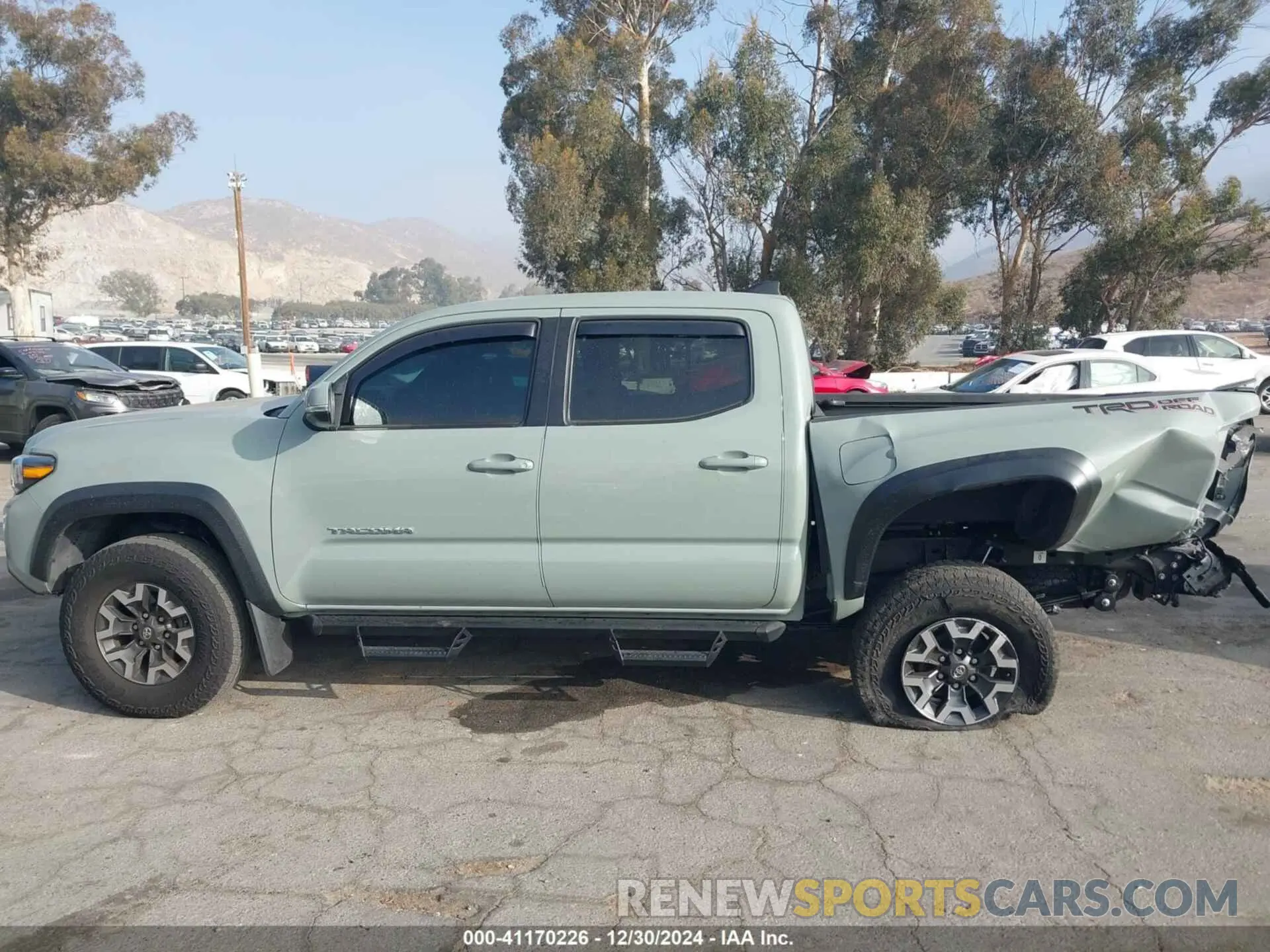 14 fotografías del automóvil dañado 3TMAZ5CNXPM204942 TOYOTA TACOMA 2023
