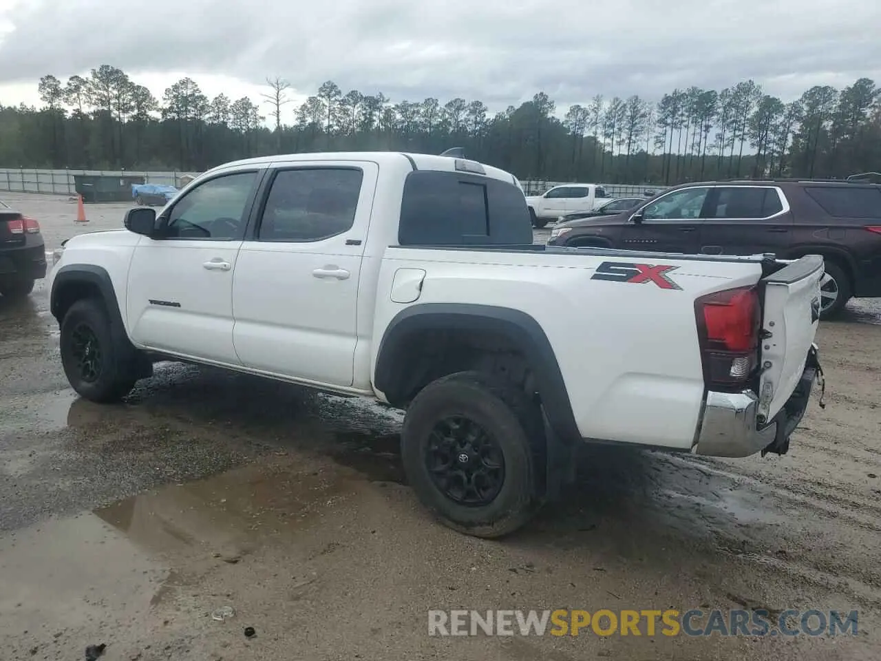2 fotografías del automóvil dañado 3TMAZ5CNXPM212698 TOYOTA TACOMA 2023