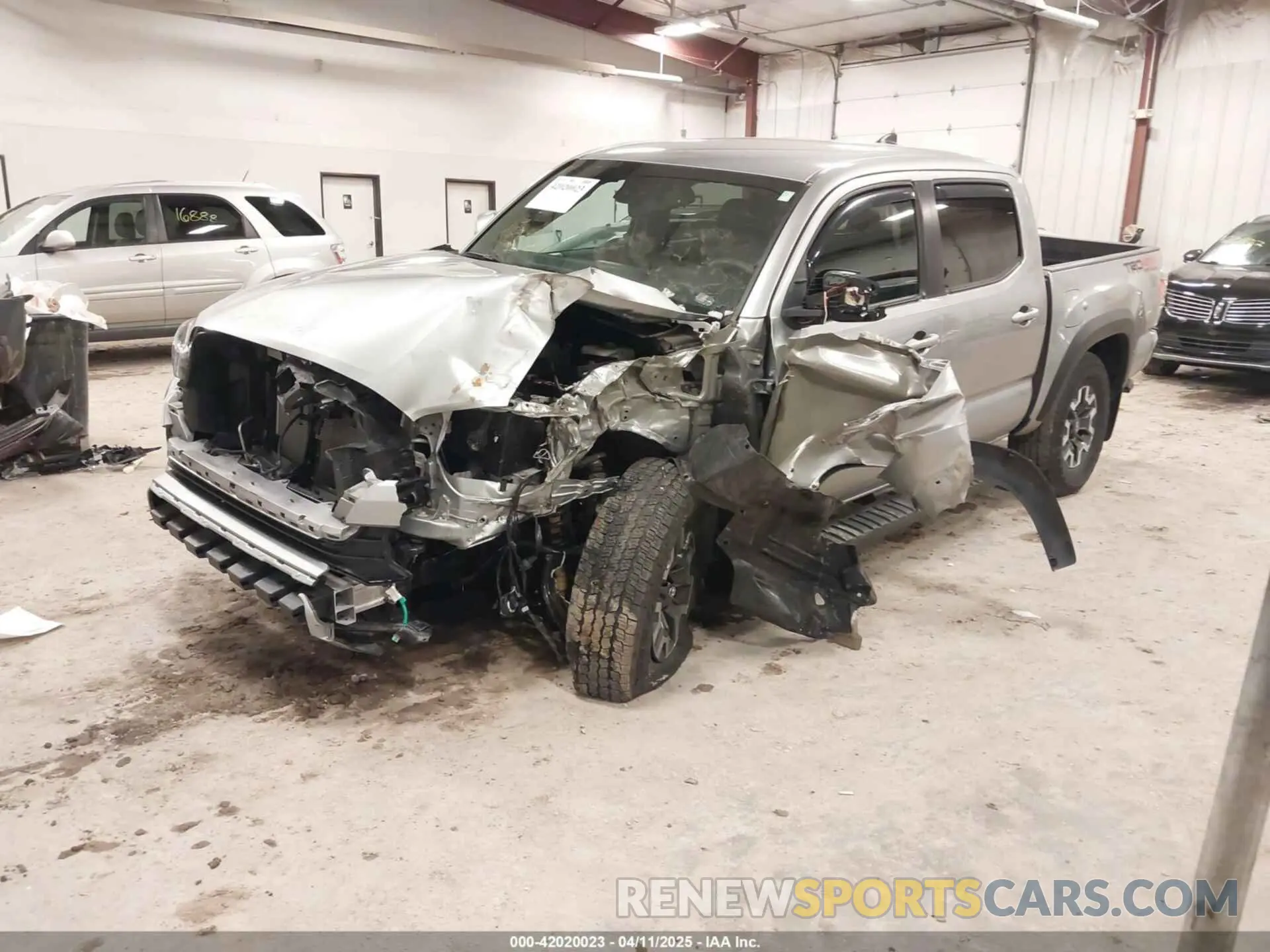 2 fotografías del automóvil dañado 3TMCZ5AN4PM597509 TOYOTA TACOMA 2023