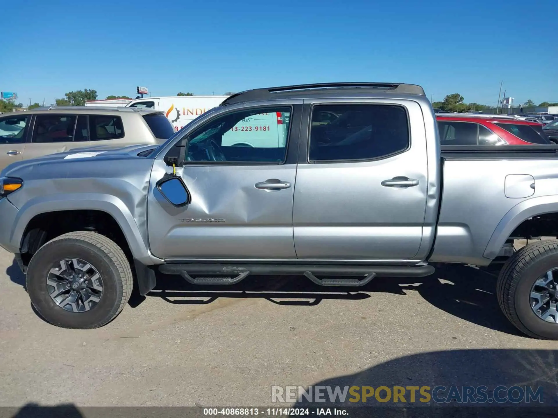 14 fotografías del automóvil dañado 3TMDZ5BN0PM147827 TOYOTA TACOMA 2023