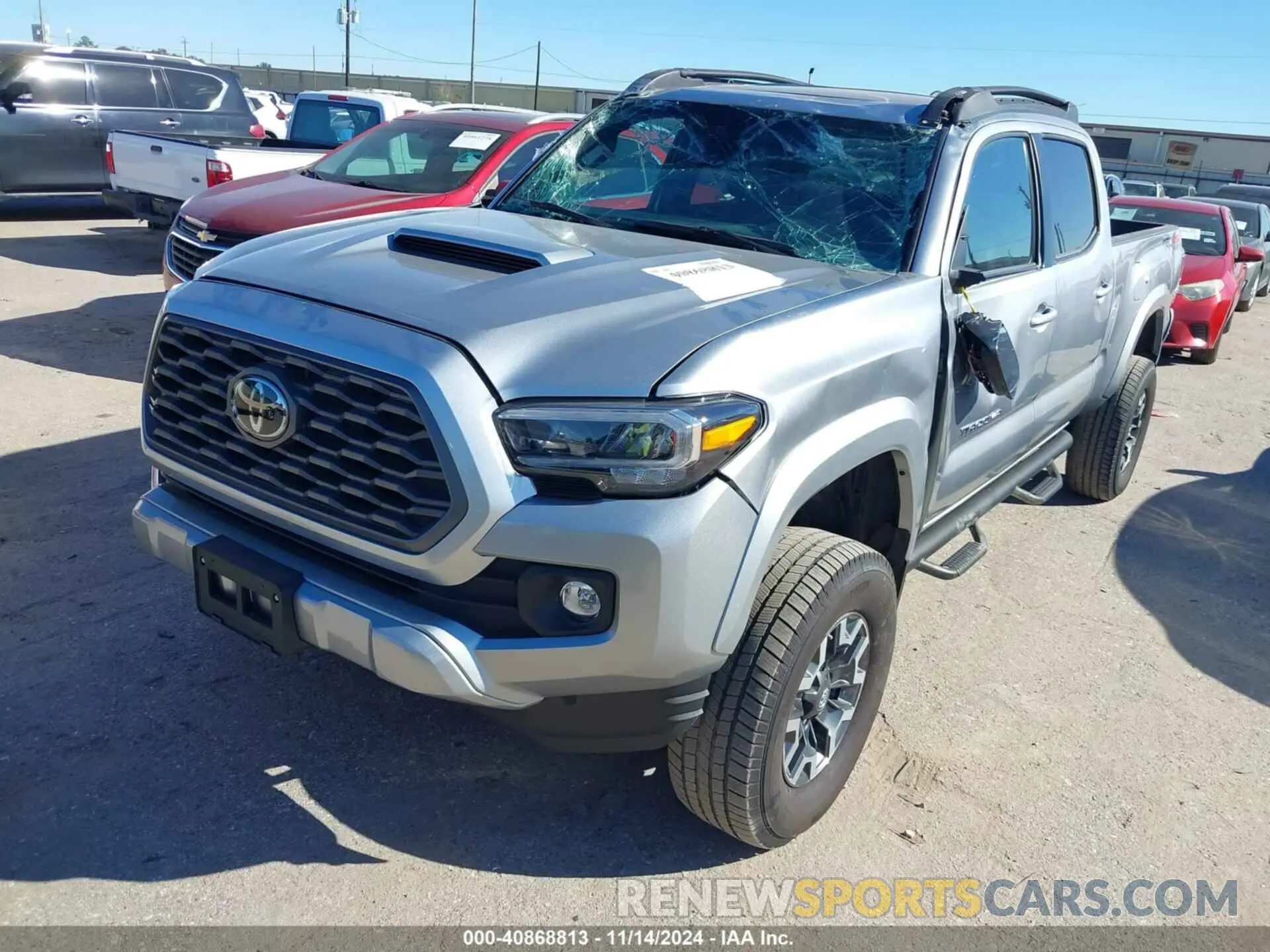 2 fotografías del automóvil dañado 3TMDZ5BN0PM147827 TOYOTA TACOMA 2023