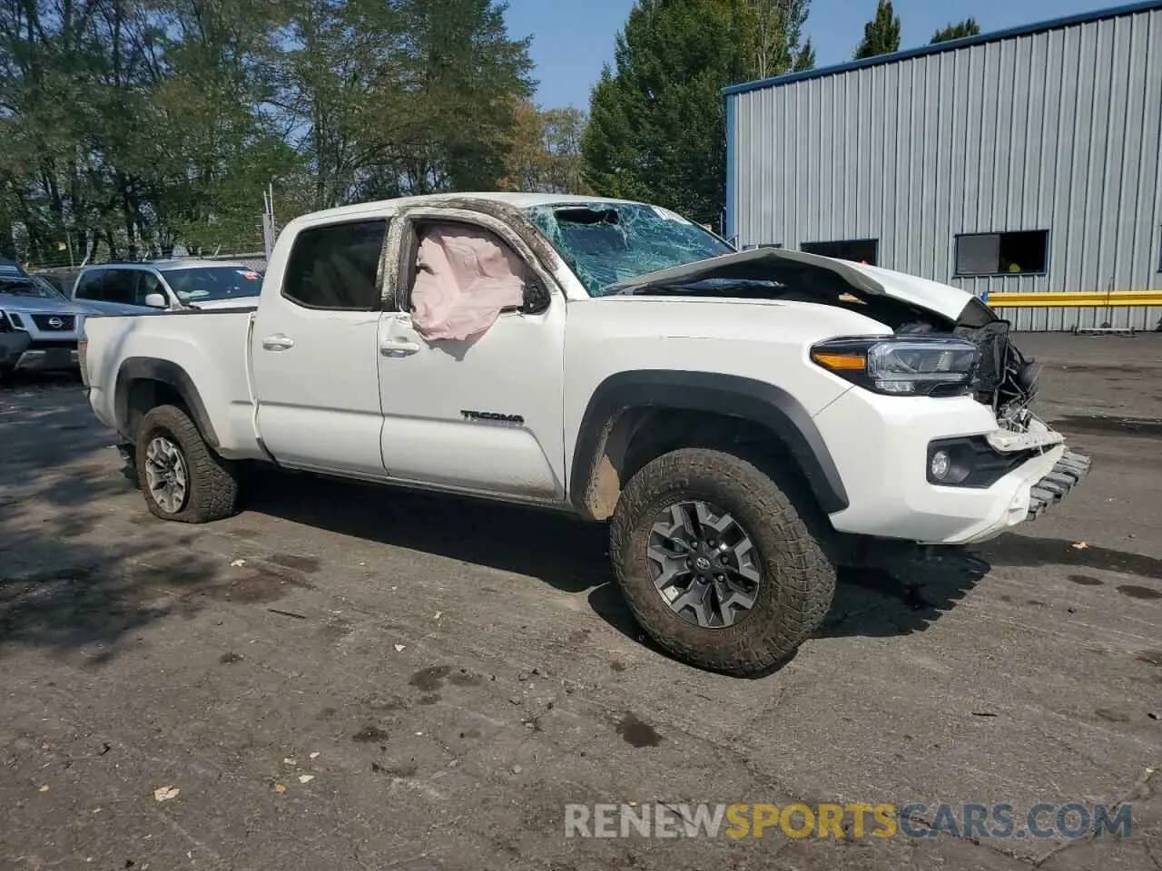 4 fotografías del automóvil dañado 3TMDZ5BN1PM167987 TOYOTA TACOMA 2023