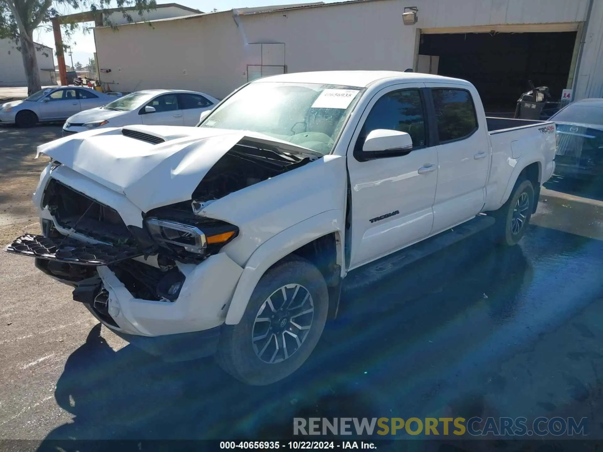 2 fotografías del automóvil dañado 3TMDZ5BN3PM142458 TOYOTA TACOMA 2023