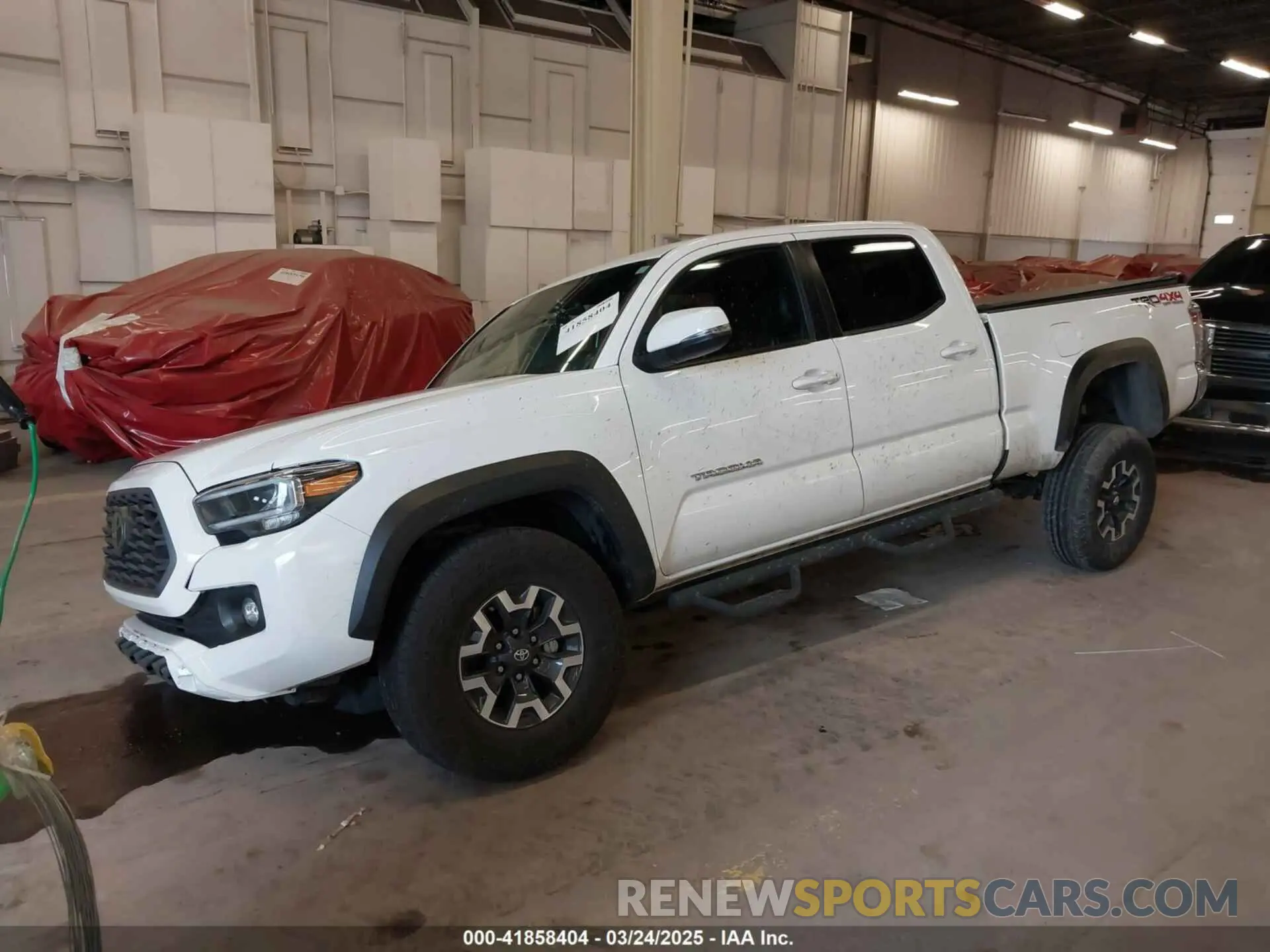 2 fotografías del automóvil dañado 3TMDZ5BN6PM155155 TOYOTA TACOMA 2023
