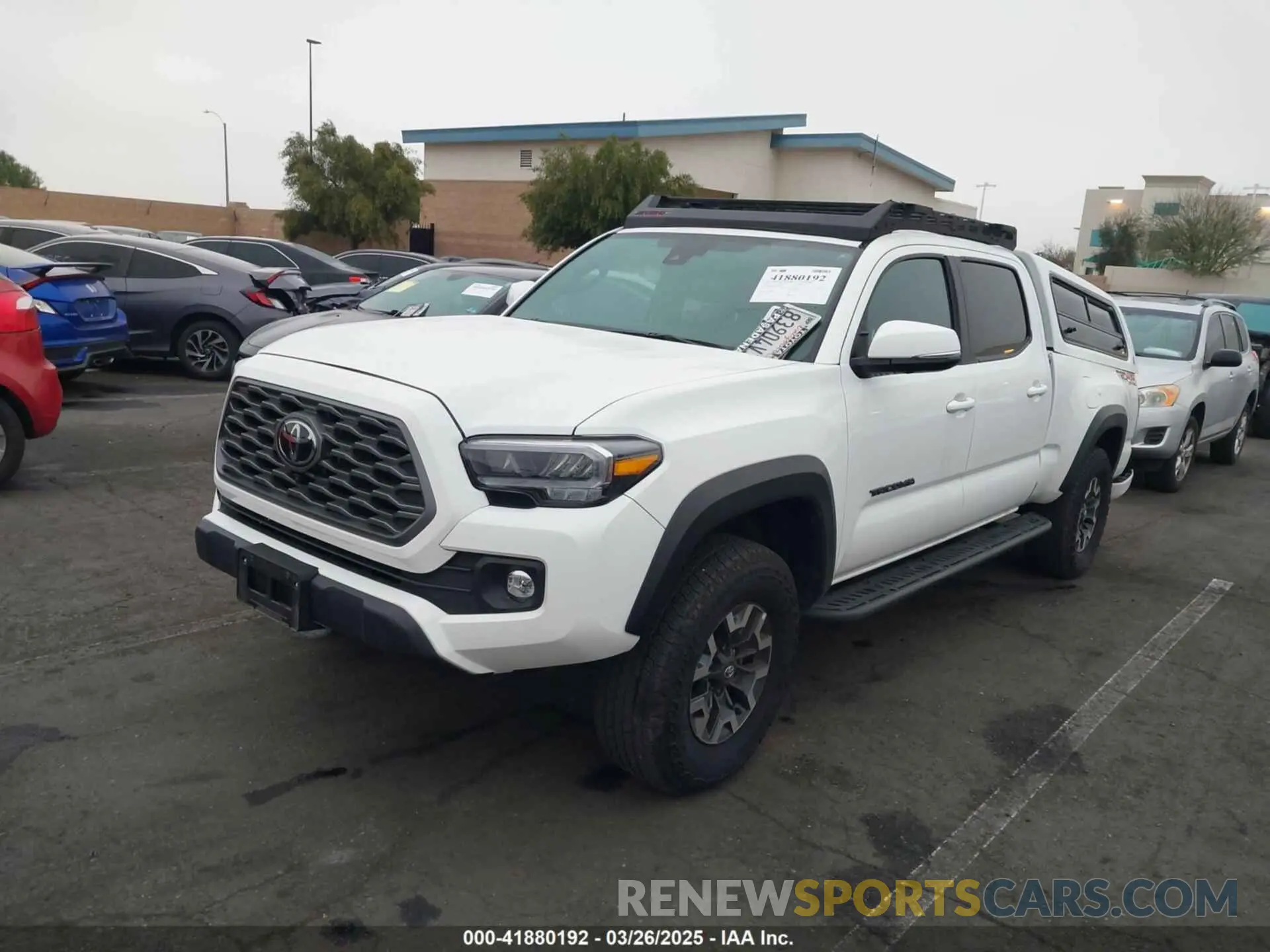 2 fotografías del automóvil dañado 3TMDZ5BN7PM162132 TOYOTA TACOMA 2023