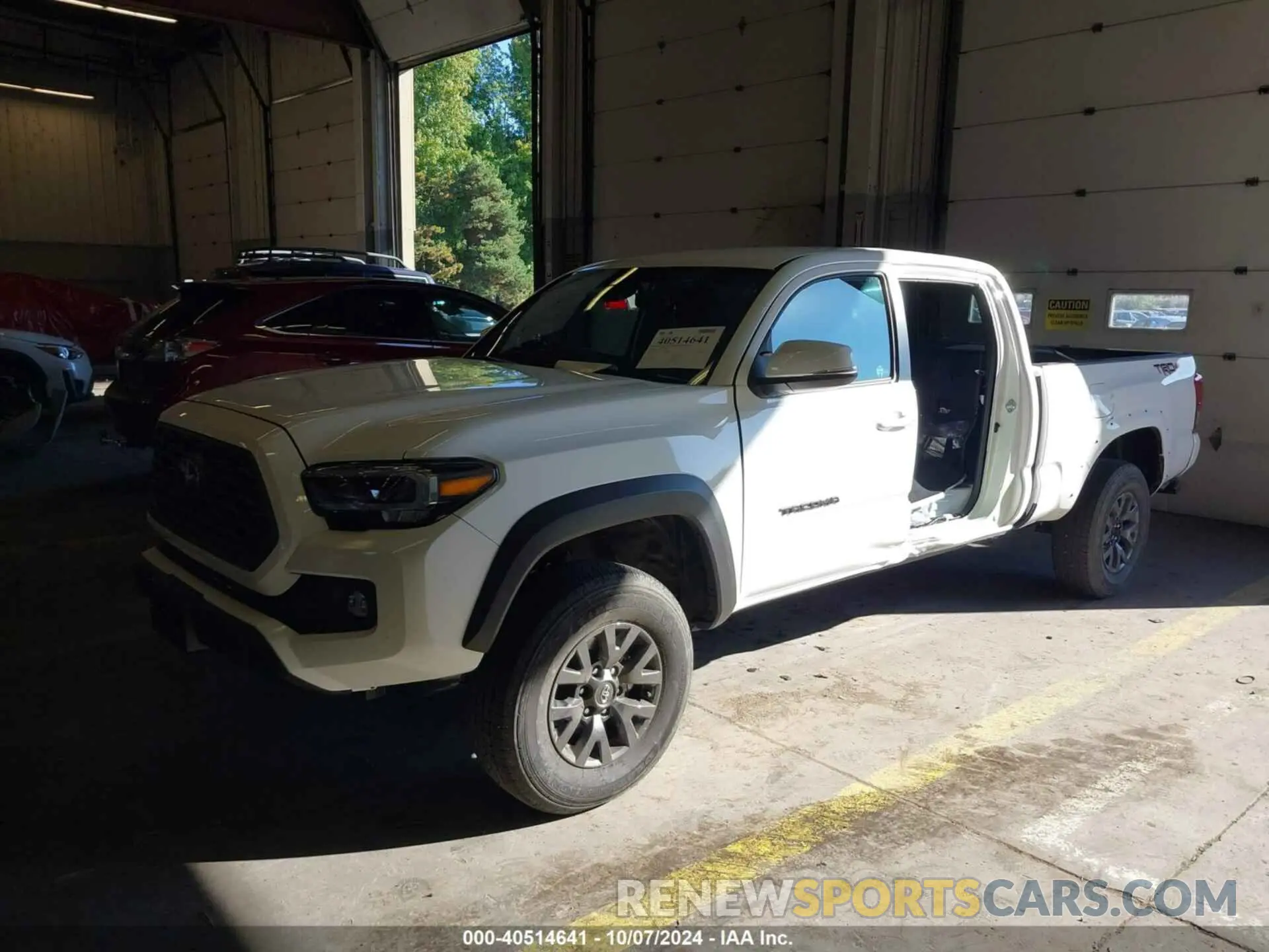2 fotografías del automóvil dañado 3TMDZ5BN7PM166746 TOYOTA TACOMA 2023