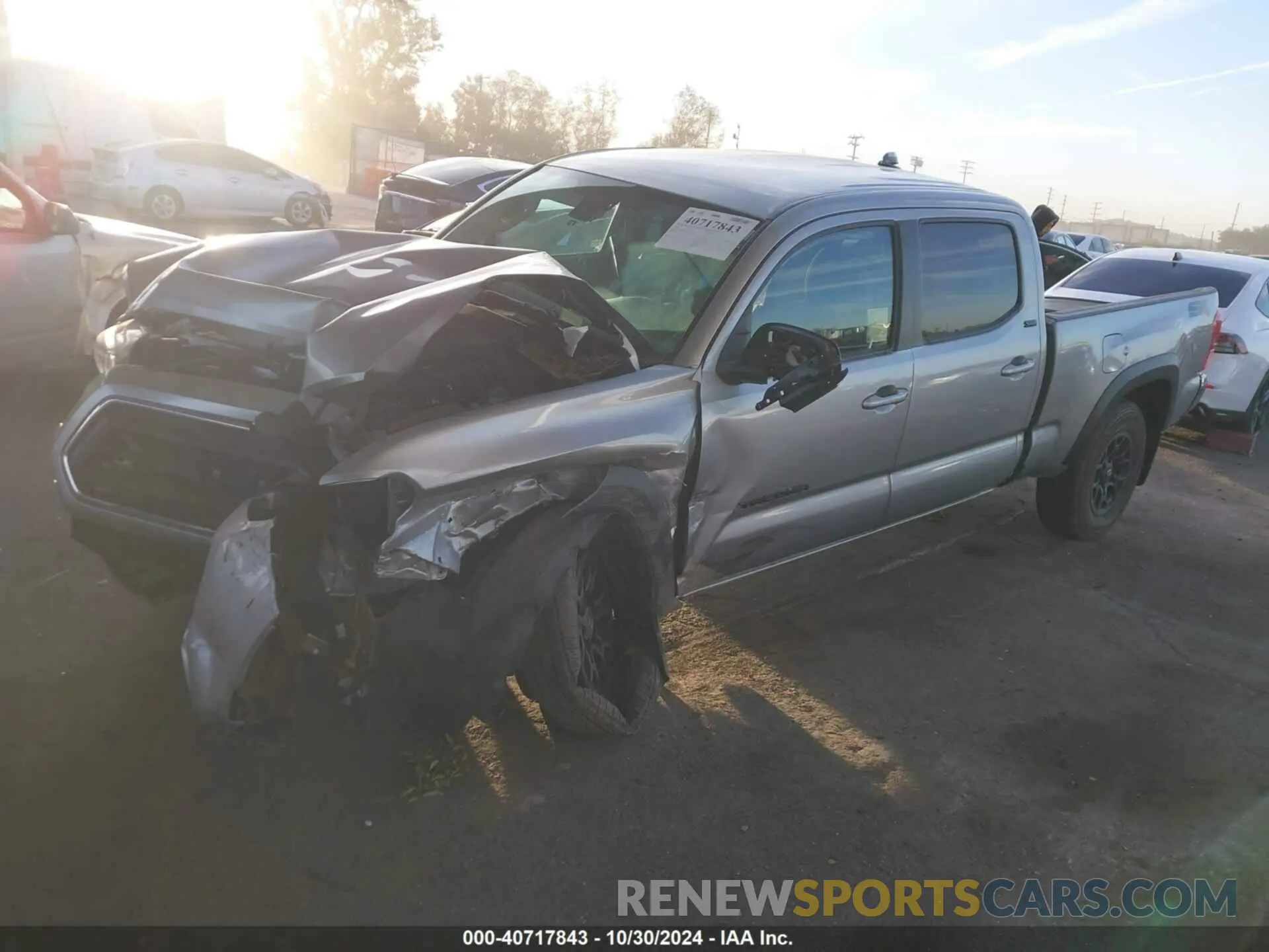 2 fotografías del automóvil dañado 3TMDZ5BN8PM142343 TOYOTA TACOMA 2023