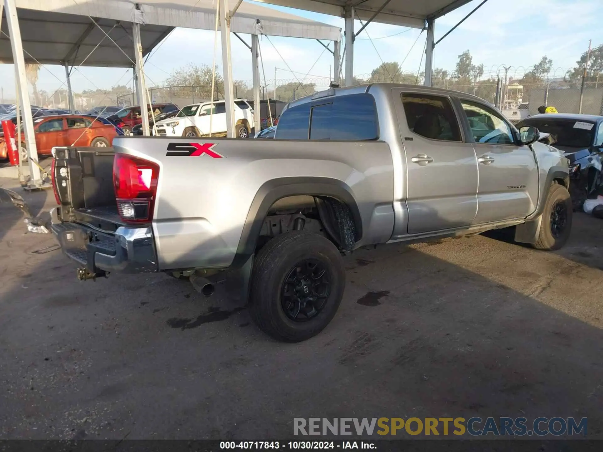 4 fotografías del automóvil dañado 3TMDZ5BN8PM142343 TOYOTA TACOMA 2023
