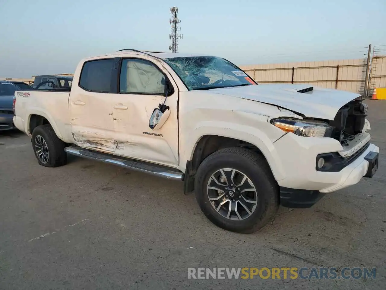 4 fotografías del automóvil dañado 3TMDZ5BN8PM142486 TOYOTA TACOMA 2023
