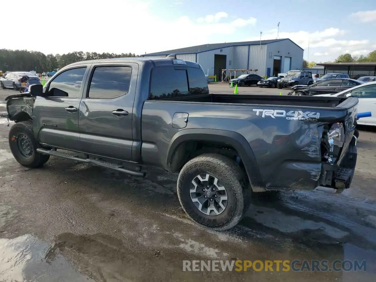 2 fotografías del automóvil dañado 3TMDZ5BNXPM141677 TOYOTA TACOMA 2023