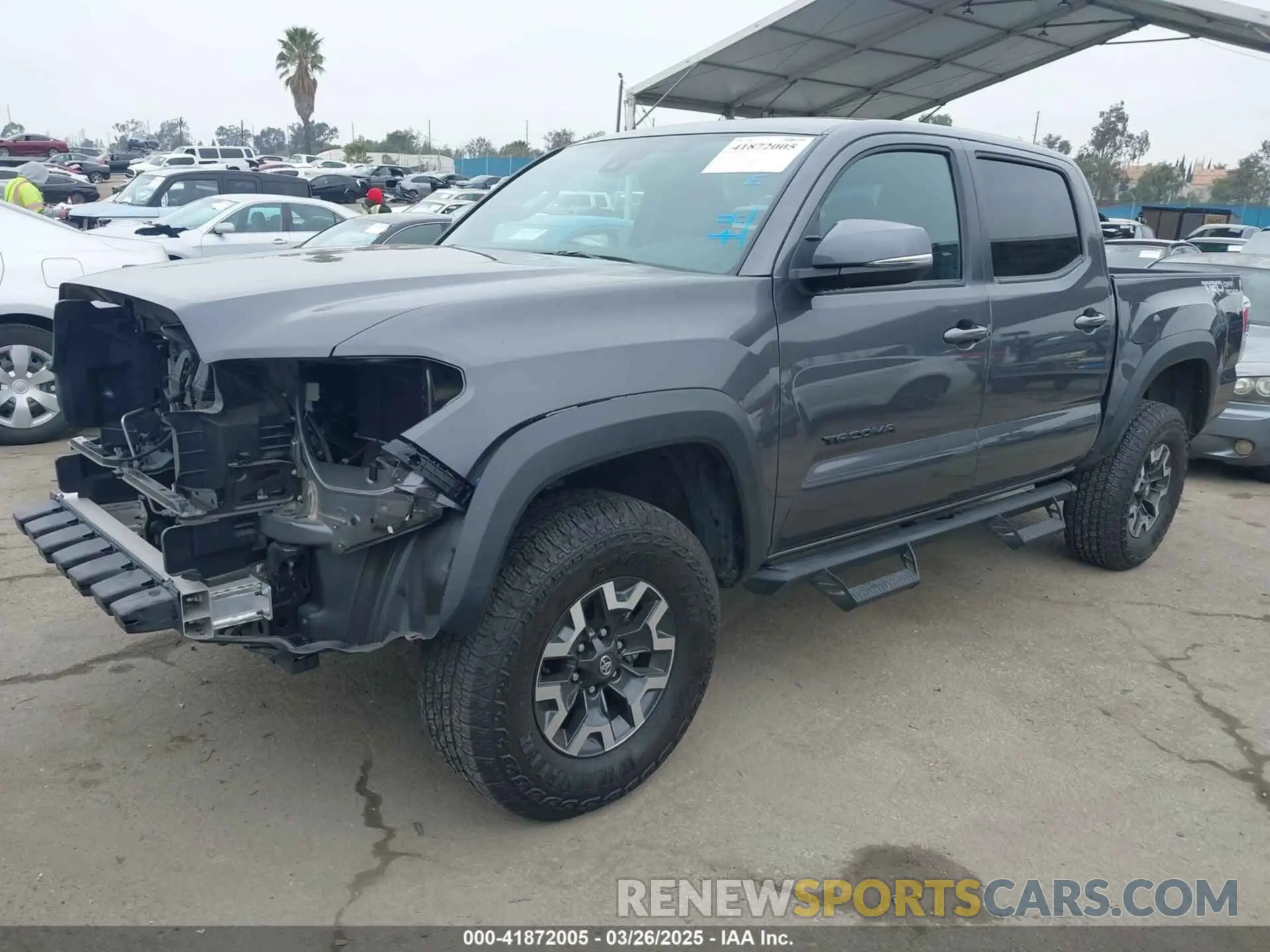 2 fotografías del automóvil dañado 3TYAZ5CN1PT041683 TOYOTA TACOMA 2023