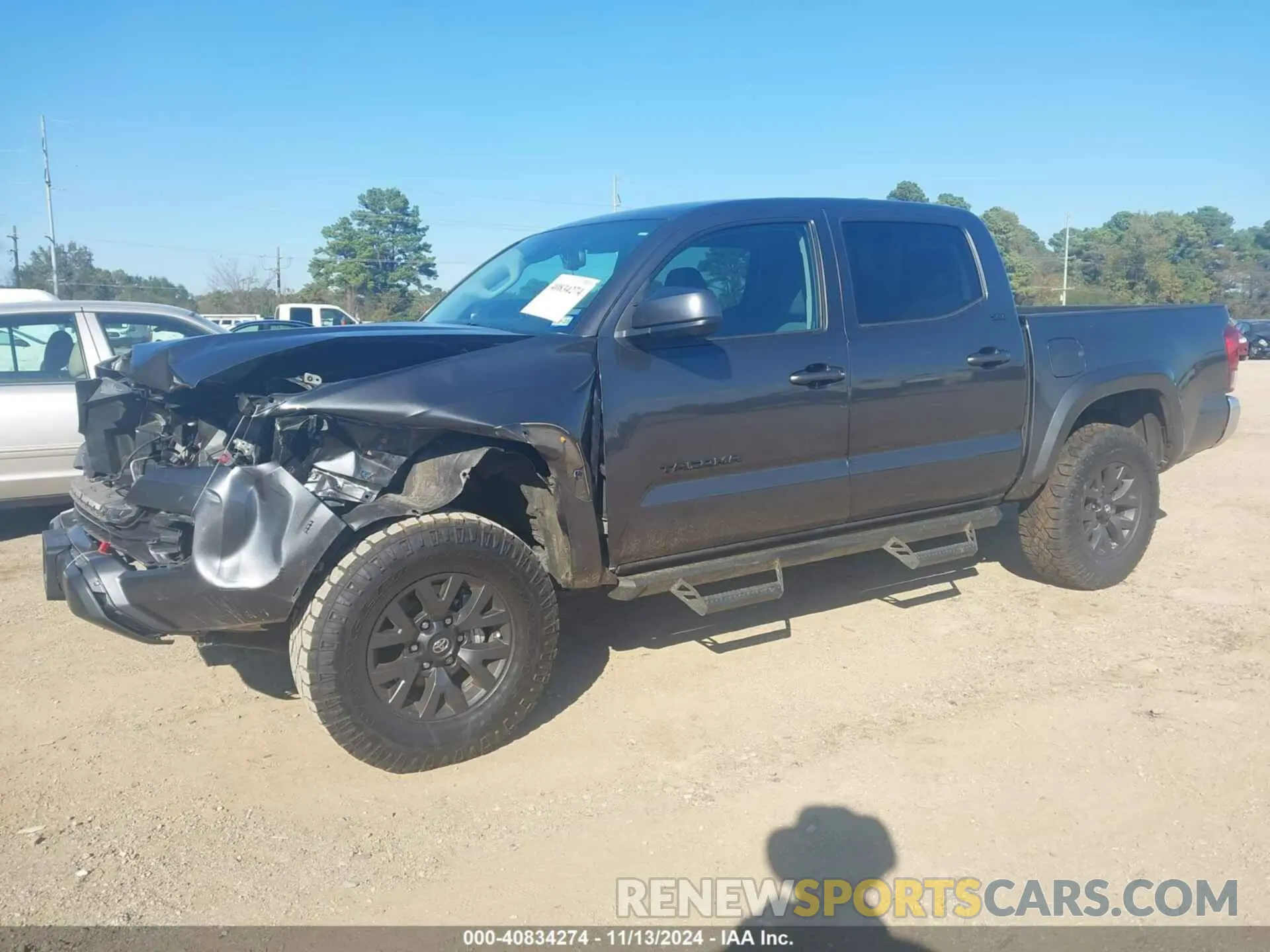 2 fotografías del automóvil dañado 3TYAZ5CN7PT034981 TOYOTA TACOMA 2023