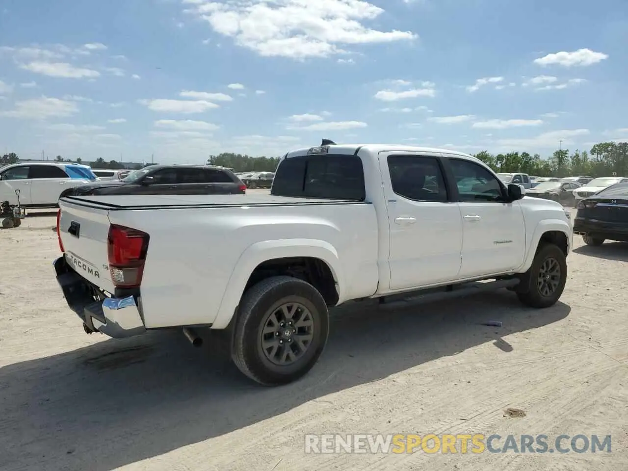 3 fotografías del automóvil dañado 3TYBZ5DNXPT002674 TOYOTA TACOMA 2023