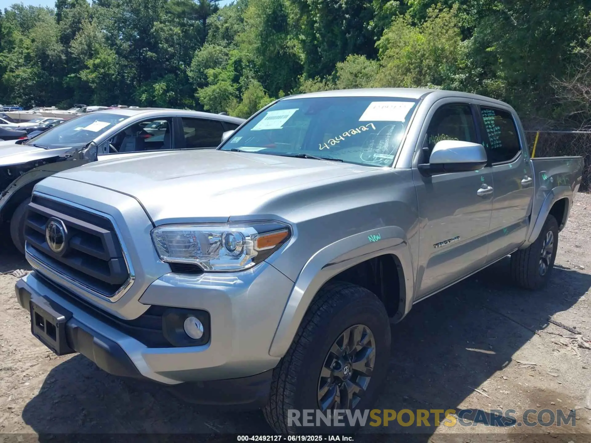 2 fotografías del automóvil dañado 3TYCZ5AN2PT141576 TOYOTA TACOMA 2023