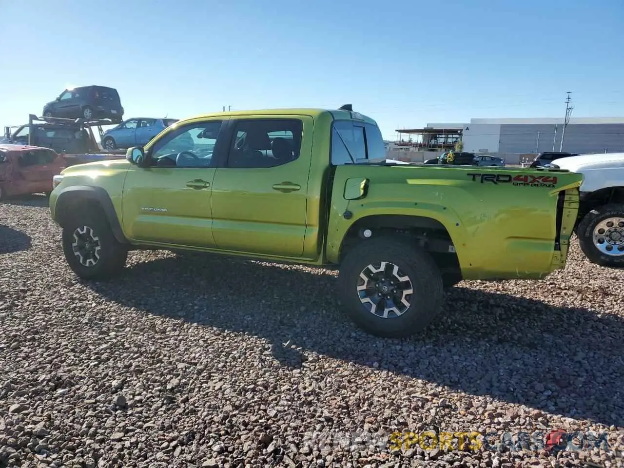 2 fotografías del automóvil dañado 3TYCZ5AN4PT127047 TOYOTA TACOMA 2023