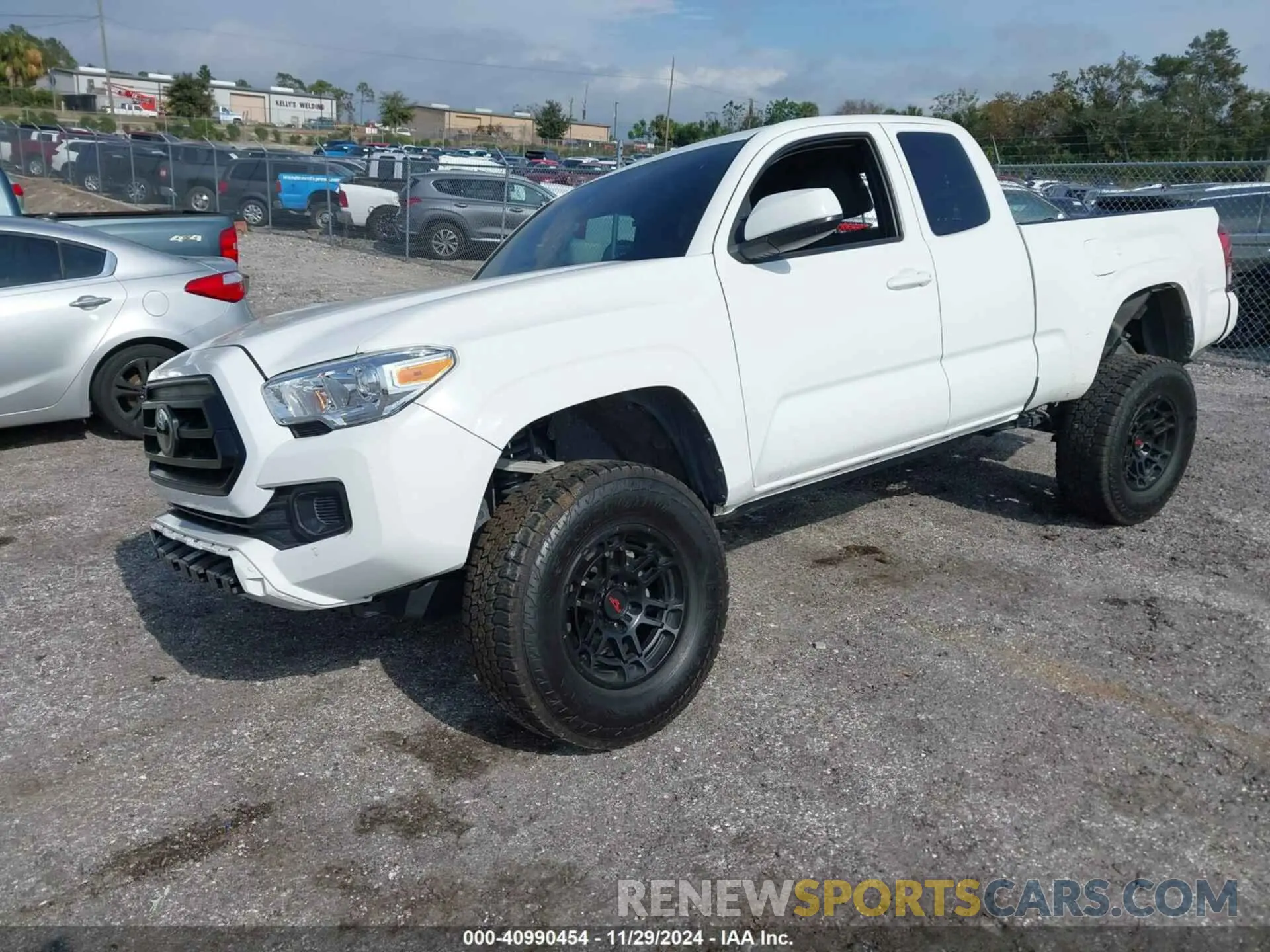 2 fotografías del automóvil dañado 3TYRZ5CN3PT028730 TOYOTA TACOMA 2023