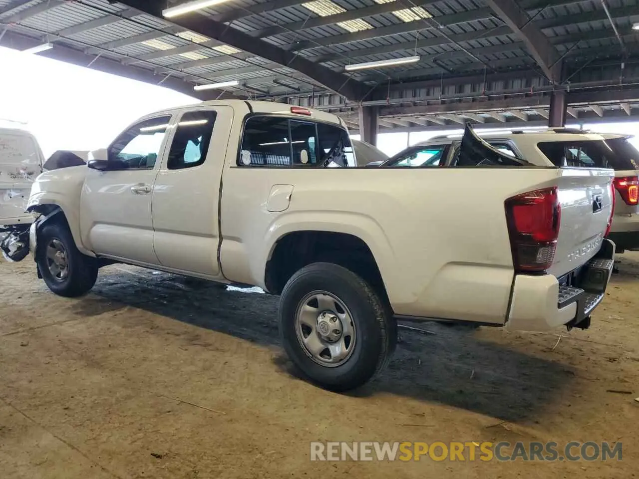 2 fotografías del automóvil dañado 3TYRZ5CN9PT026979 TOYOTA TACOMA 2023