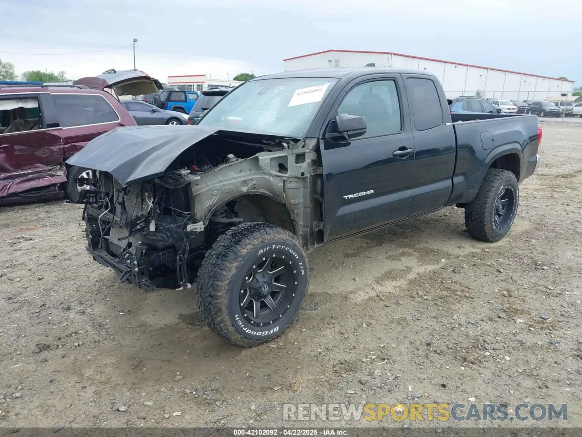 2 fotografías del automóvil dañado 3TYSX5EN2PT019277 TOYOTA TACOMA 2023