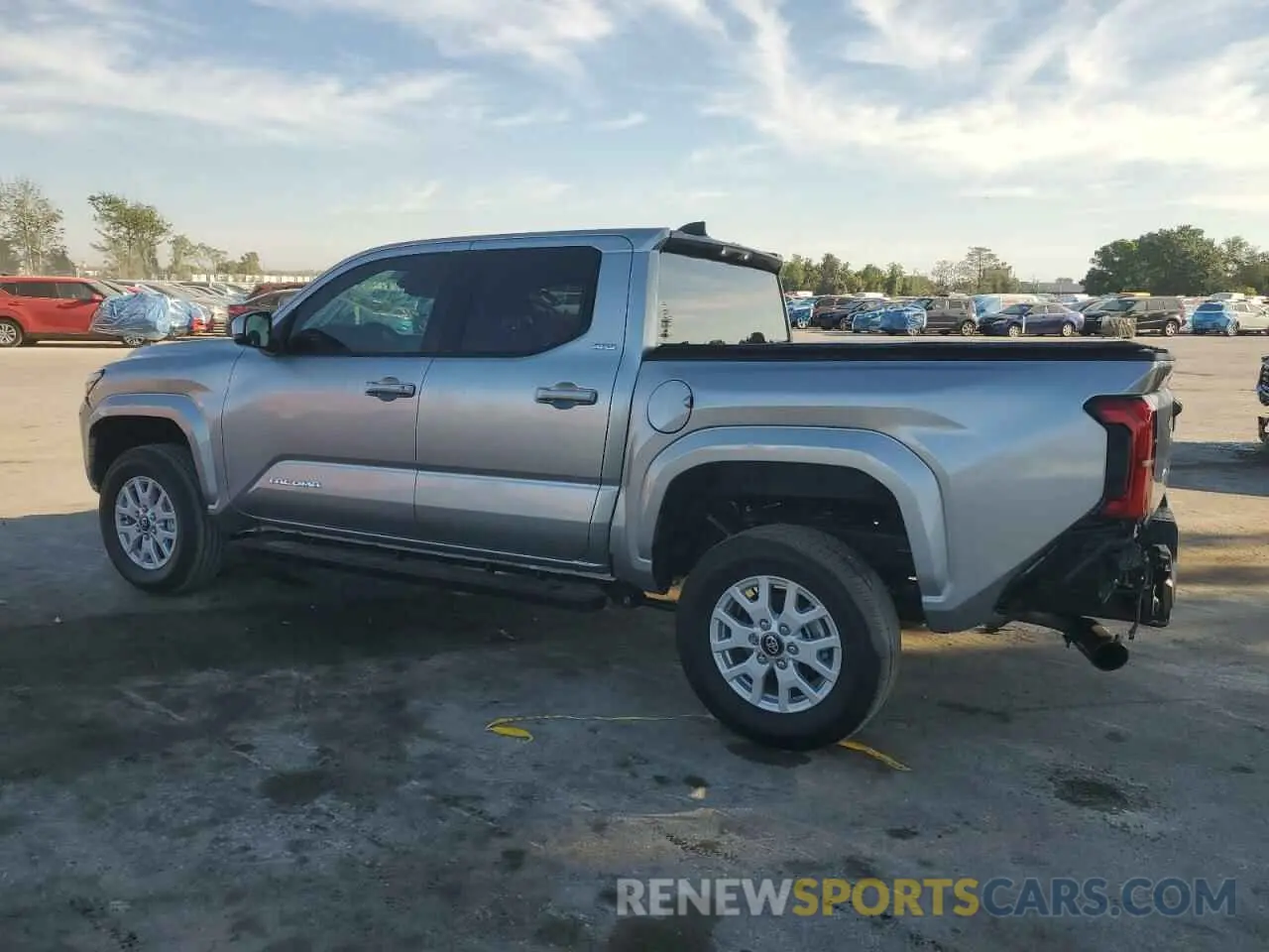2 fotografías del automóvil dañado 3TMKB5FN3RM016061 TOYOTA TACOMA 2024