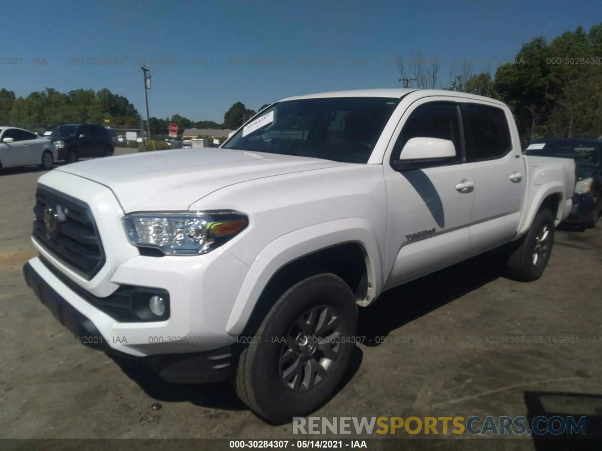 2 fotografías del automóvil dañado 3TMAZ5CN1KM102373 TOYOTA TACOMA 2WD 2019