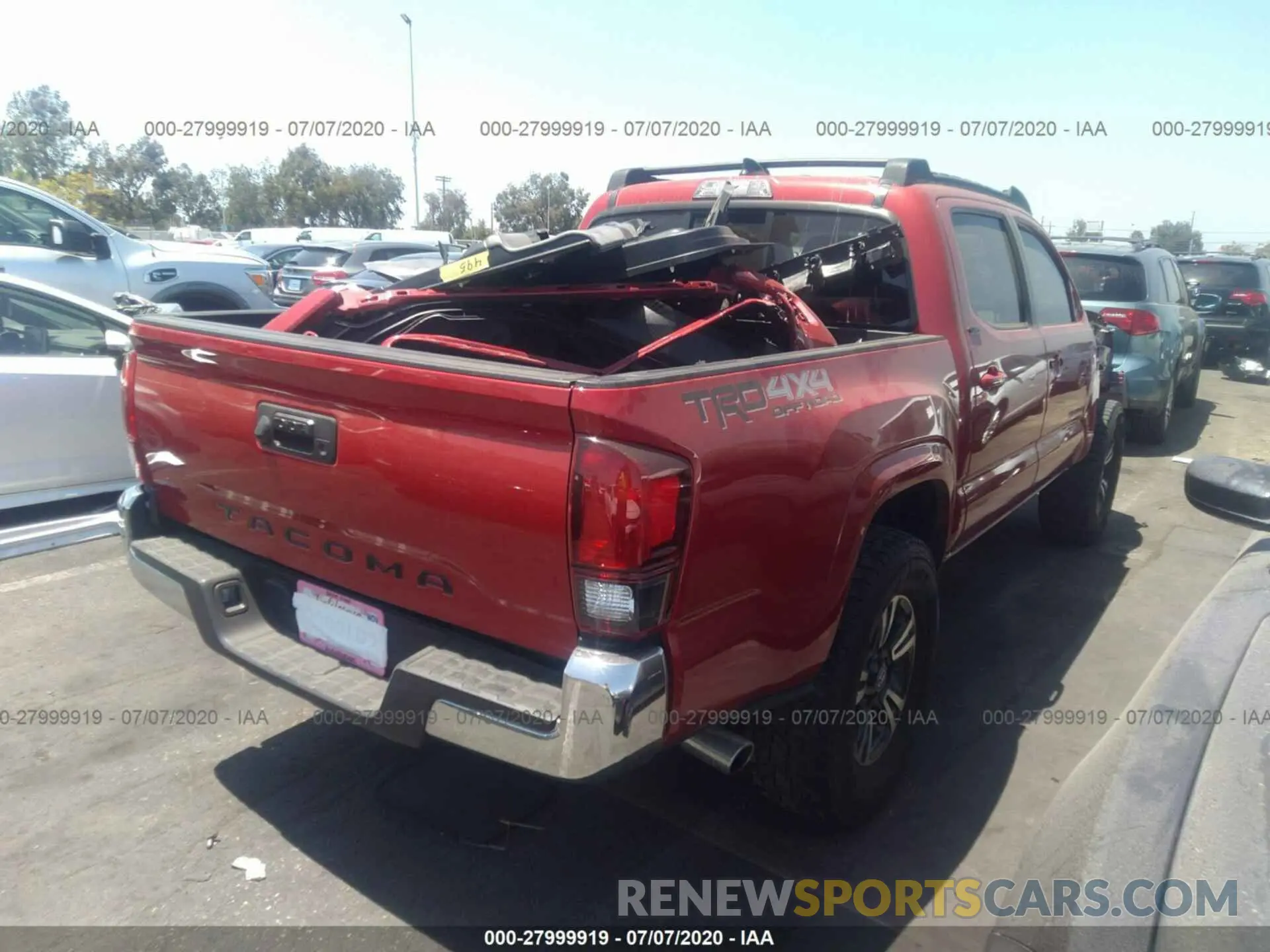 4 fotografías del automóvil dañado 5TFAX5GN3KX136809 TOYOTA TACOMA 2WD 2019