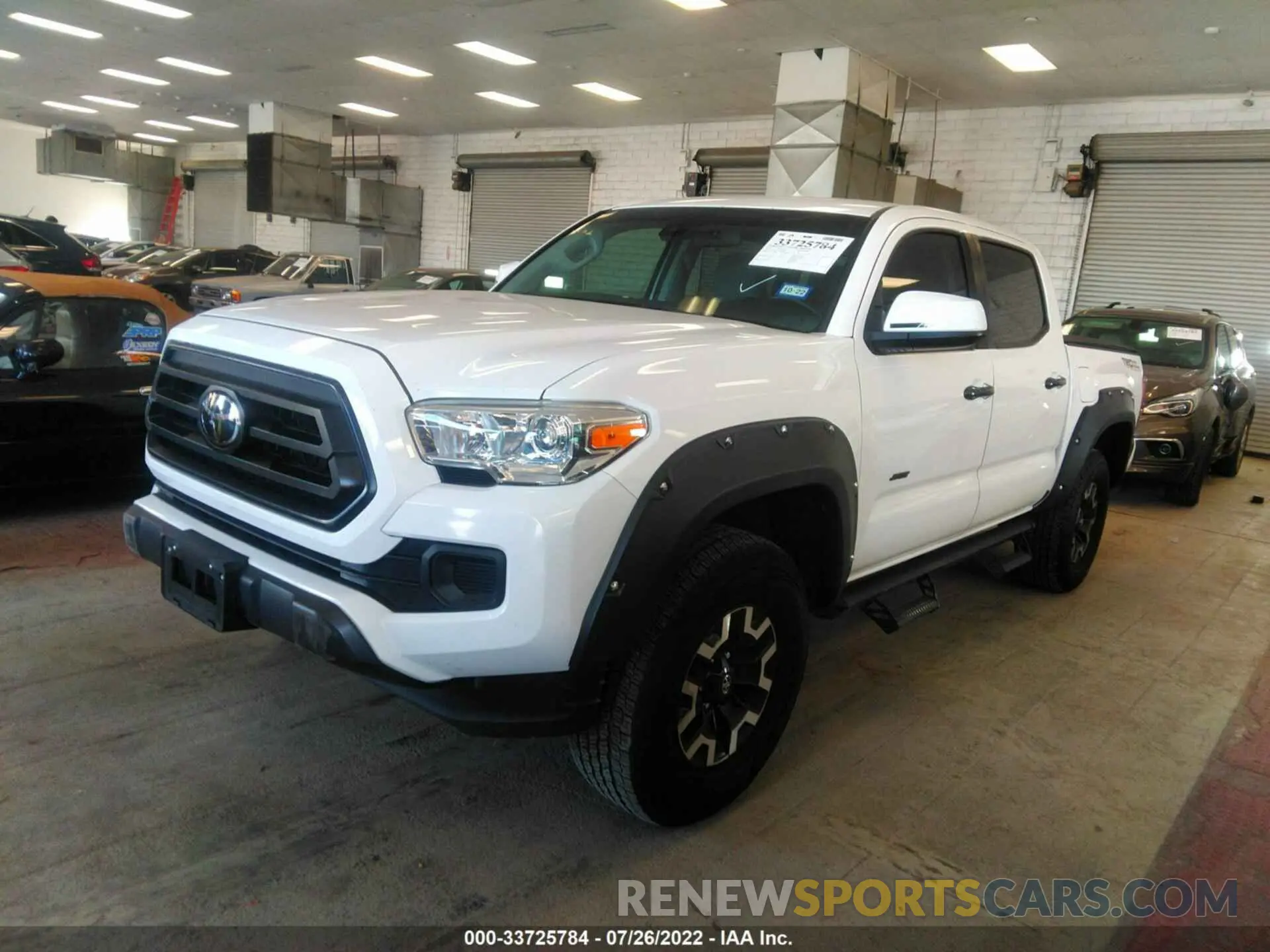 2 fotografías del automóvil dañado 5TFAX5GN9LX186860 TOYOTA TACOMA 2WD 2020