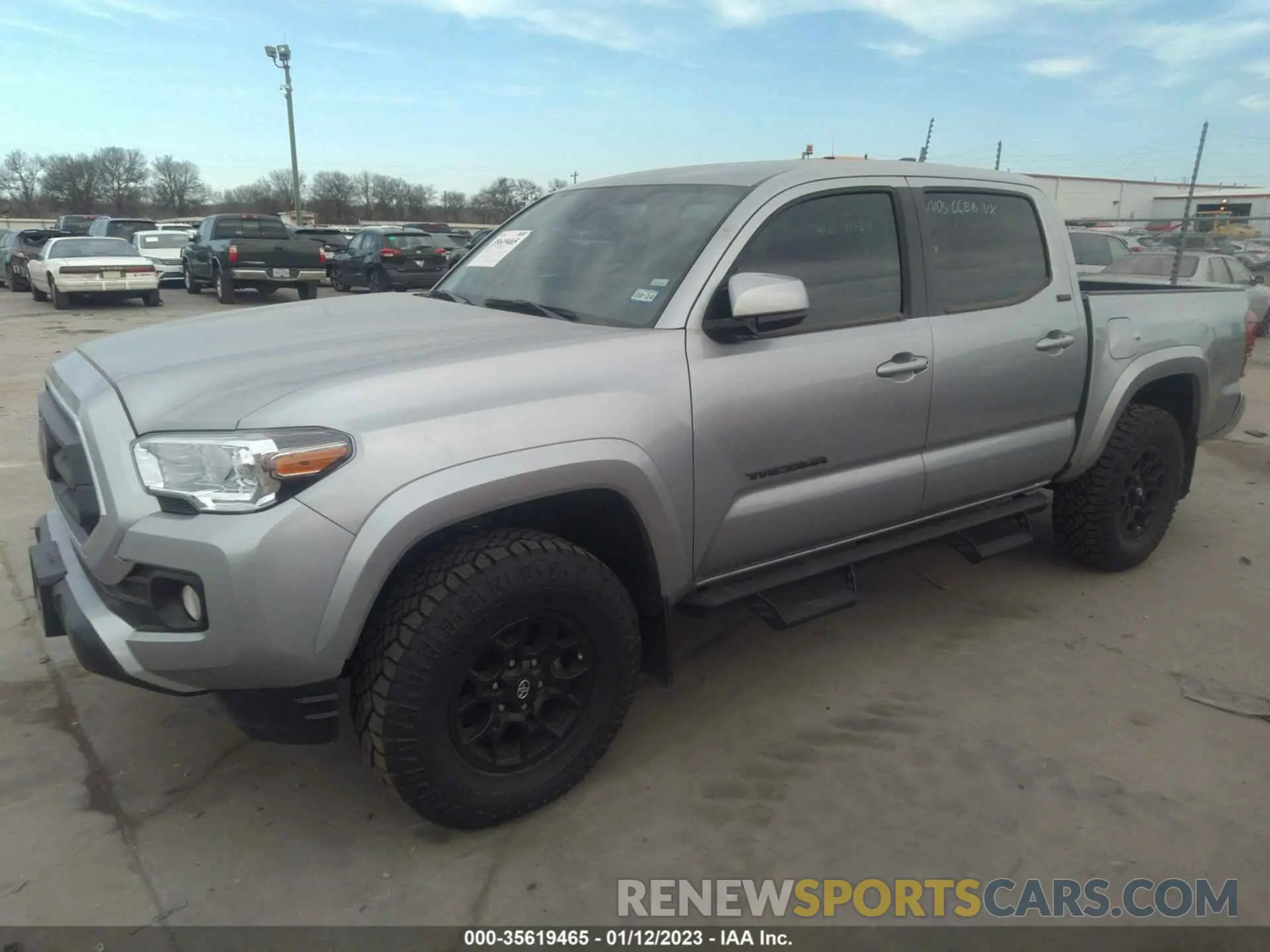 2 fotografías del automóvil dañado 3TMAZ5CN3NM192355 TOYOTA TACOMA 2WD 2022