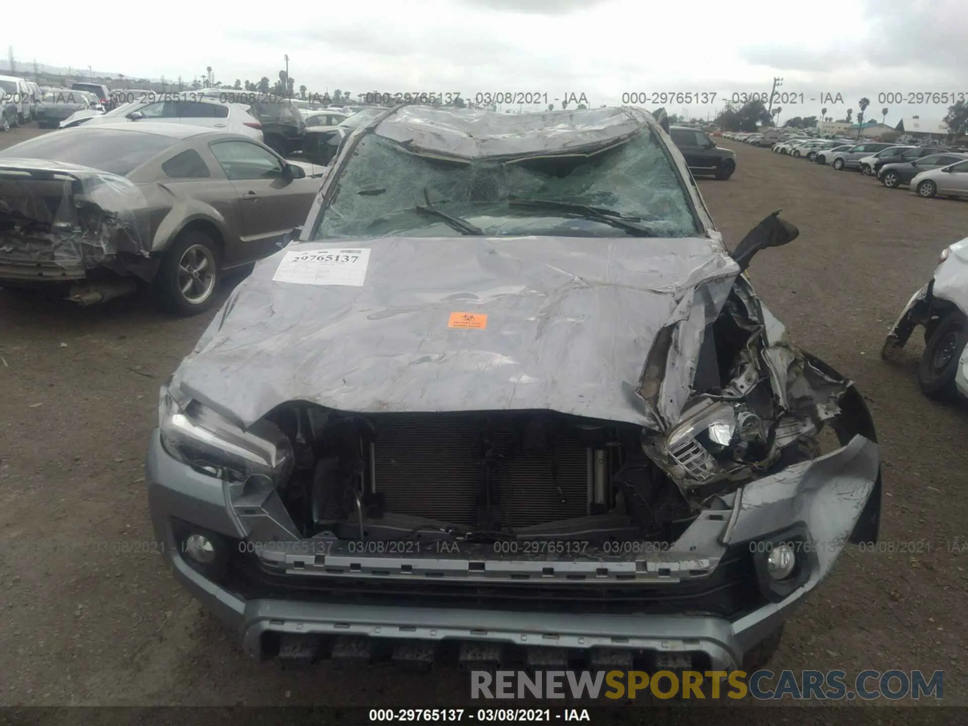 6 fotografías del automóvil dañado 3TMDZ5BN6LM098580 TOYOTA TACOMA 4WD 2020