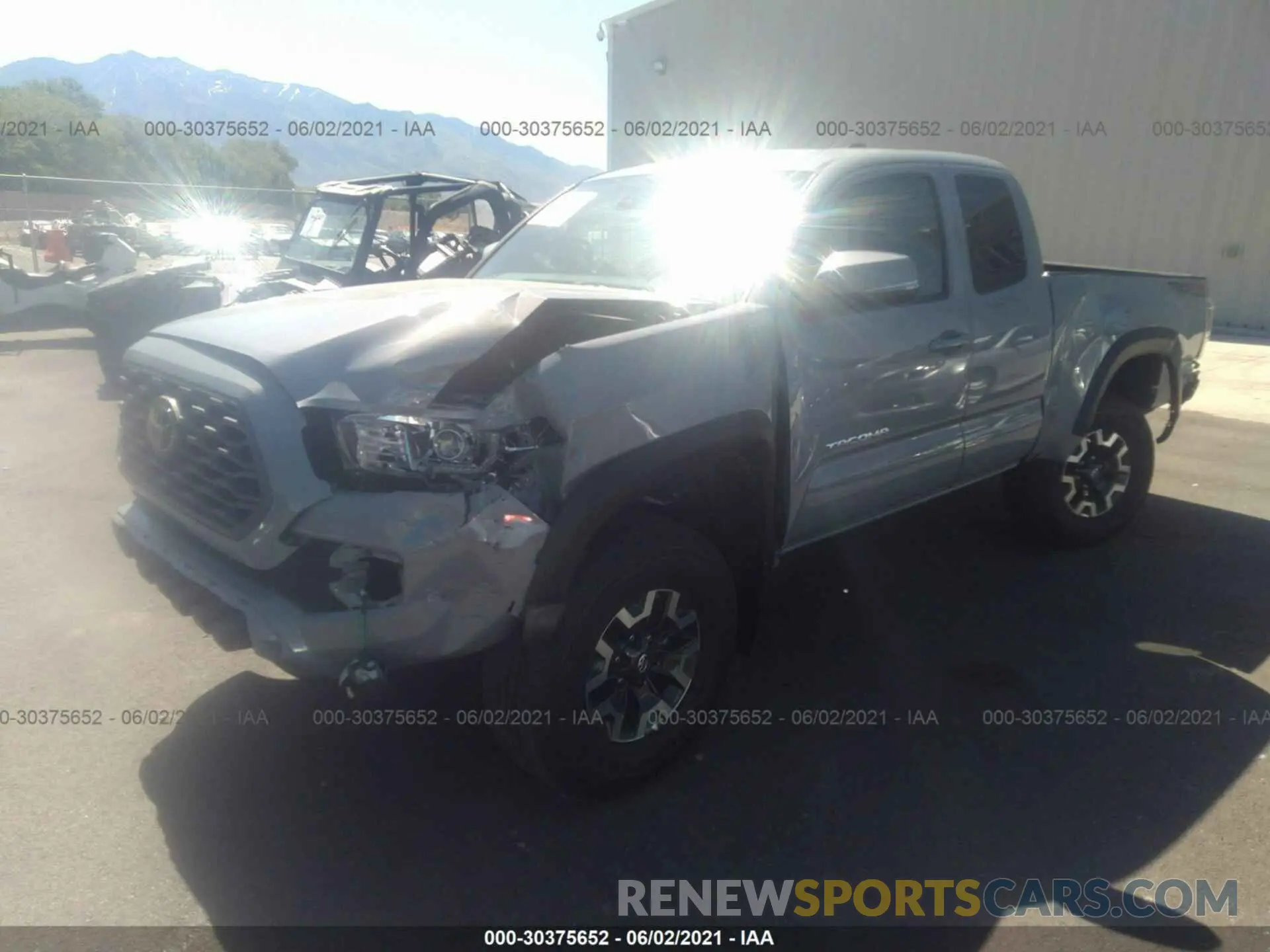 2 fotografías del automóvil dañado 3TYSZ5AN8MT008666 TOYOTA TACOMA 4WD 2021