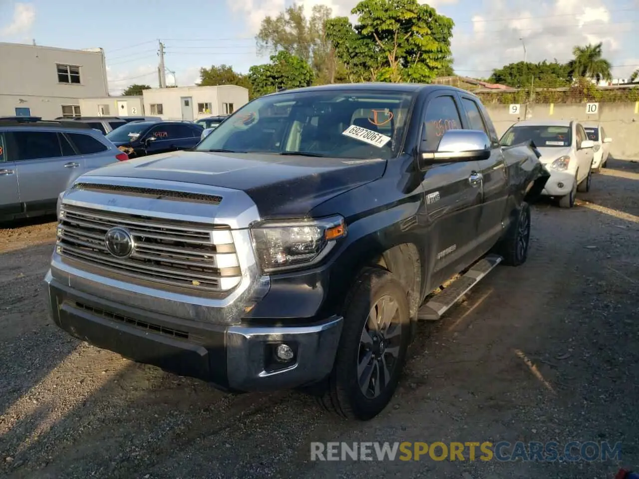 2 fotografías del automóvil dañado 5TFSY5F15KX254358 TOYOTA TUNDRA 2019
