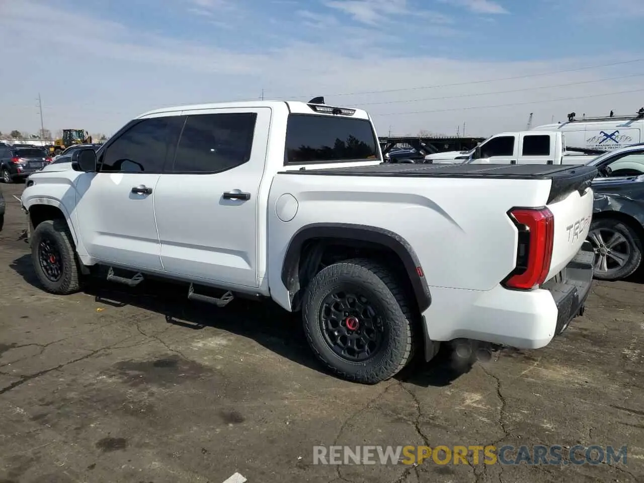 2 fotografías del automóvil dañado 5TFPC5DBXNX002089 TOYOTA TUNDRA 2022