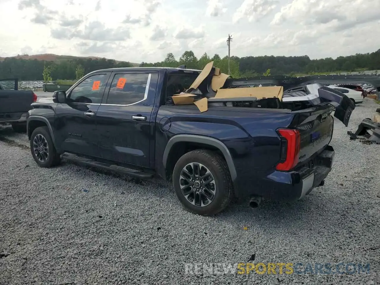 2 fotografías del automóvil dañado 5TFJA5DB4PX077353 TOYOTA TUNDRA 2023